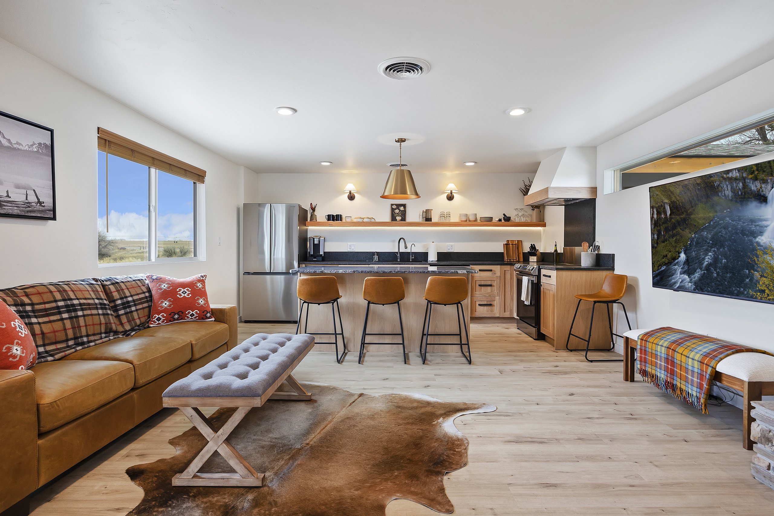 Open, light-filled living room with room to relax