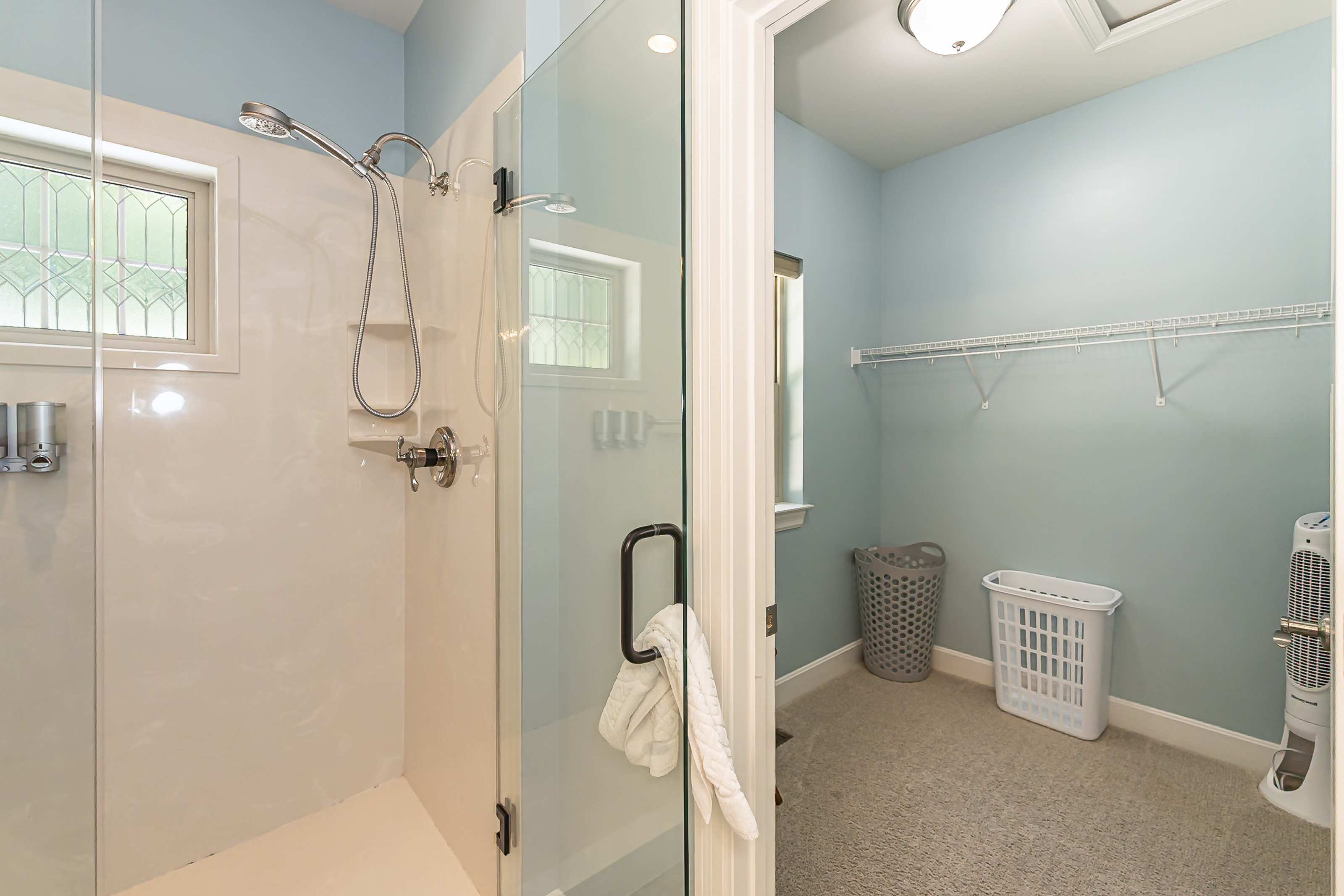 Bathroom 2 has an attached walk-in closet