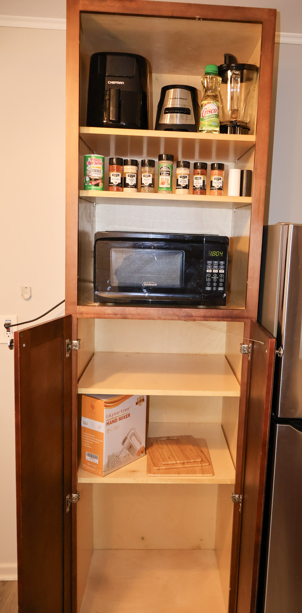 Microwave, blender, air fryer, electric hand mixer, and some seasonings.