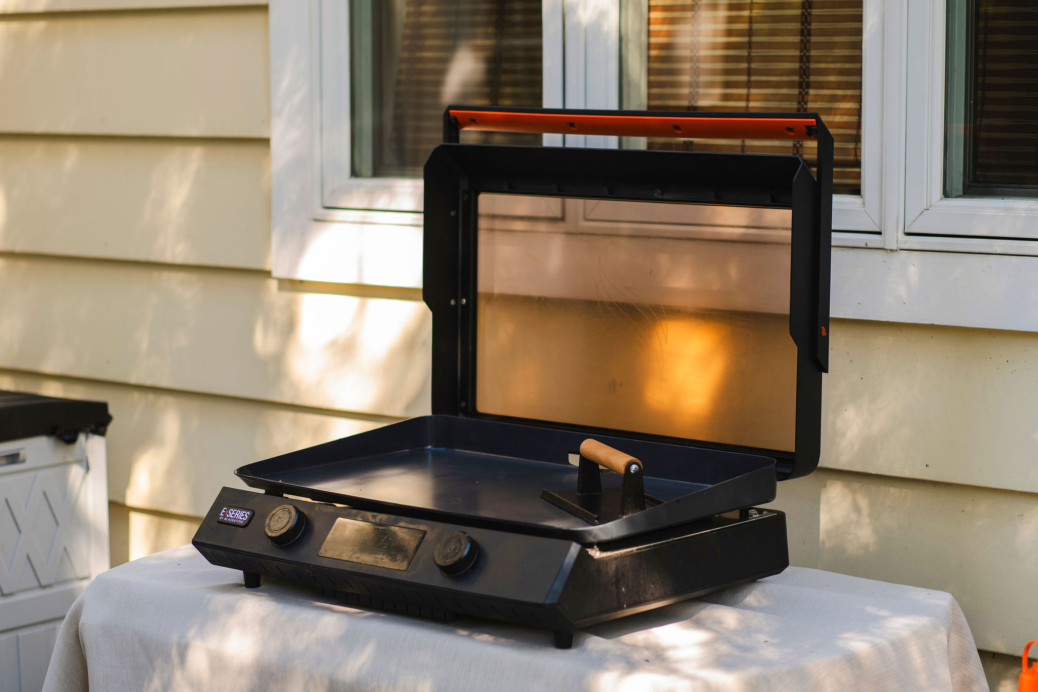 Outdoor grill and dining area on our patio.