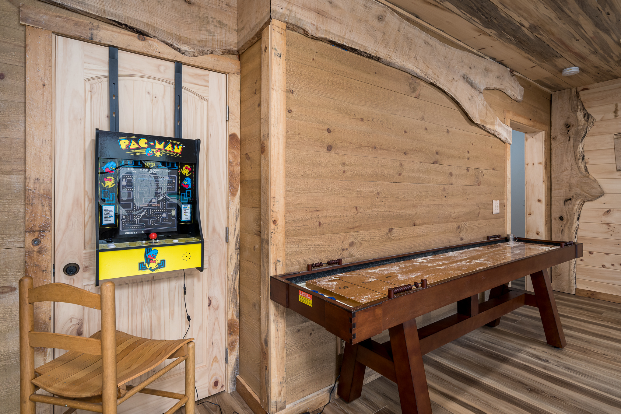 Shuffle board and Pac Man game arcade