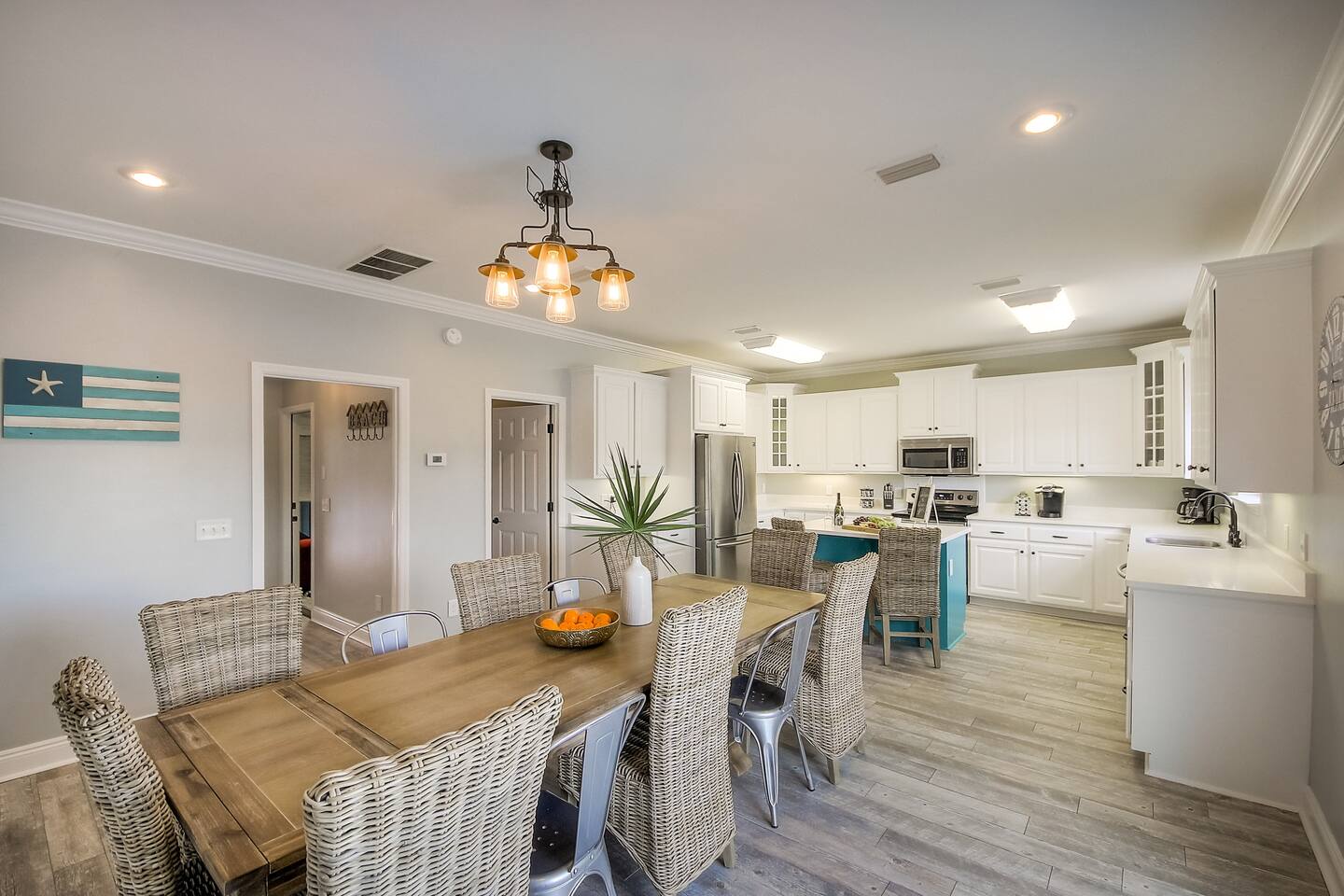 The newly remodeled kitchen is large and open! It  is fully stocked with everything you would ever need! 