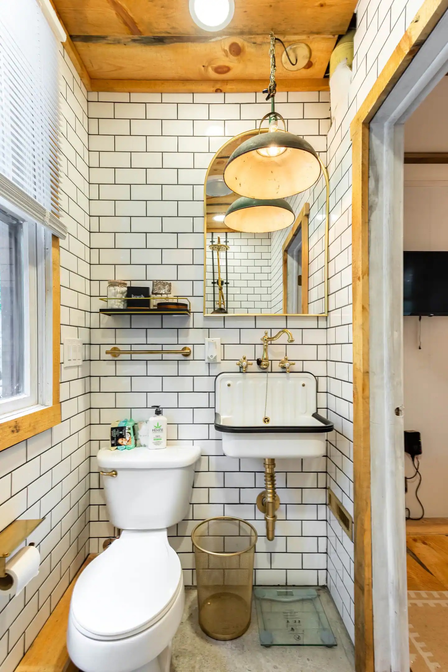 Downstairs bathroom wrapped in stylish subway tile.