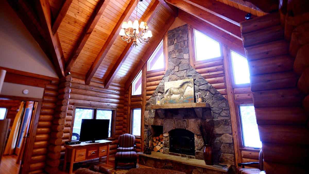 Upstairs great room with wood burning fireplace