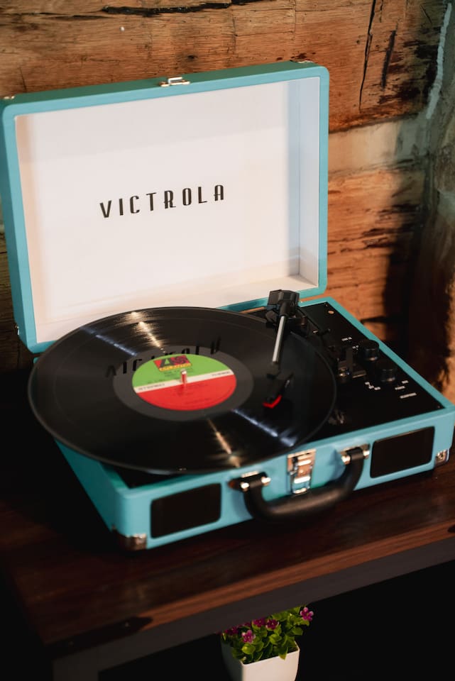 Set the mood with the timeless sounds of vinyl from the Victrola.