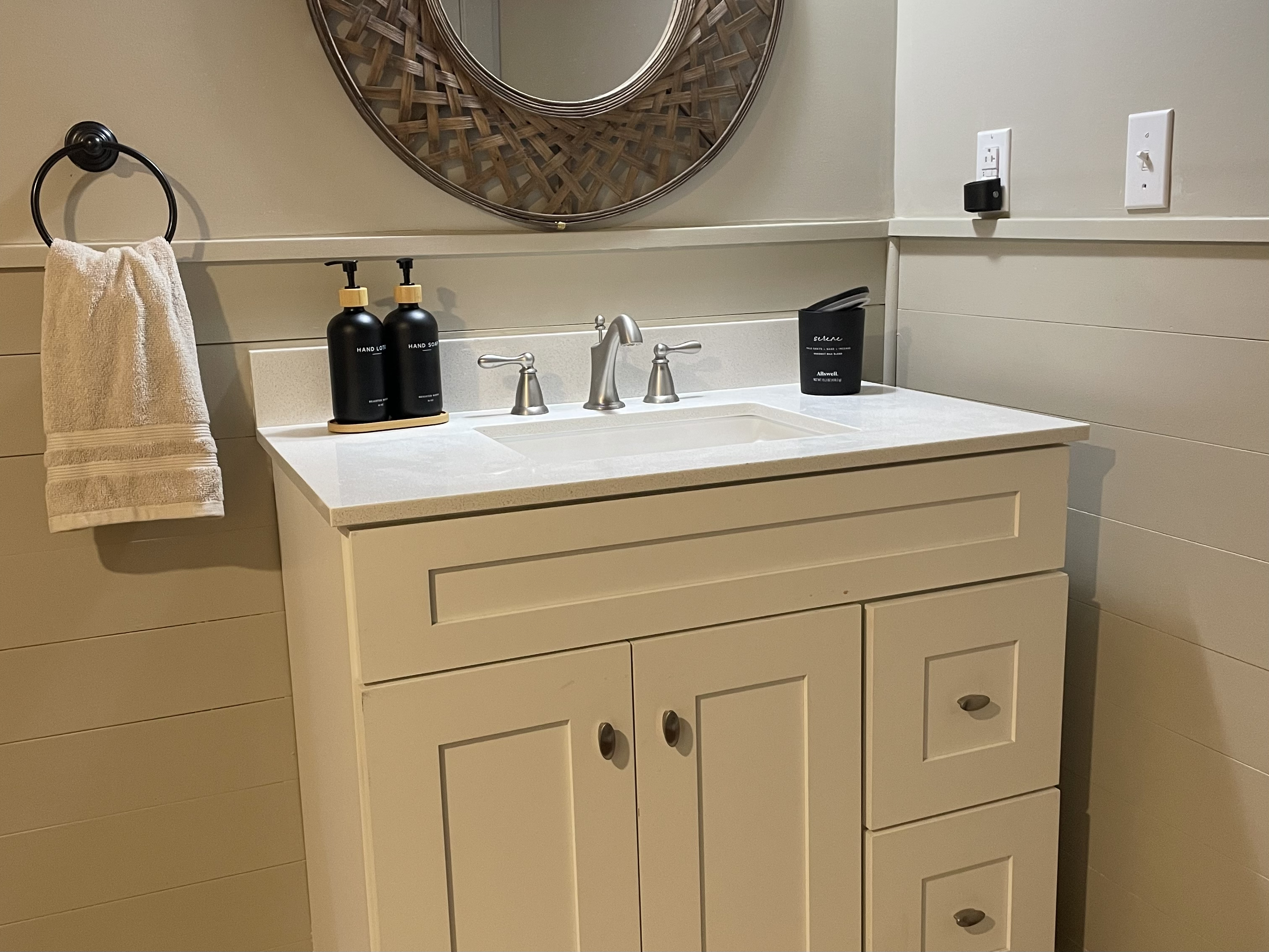 Clean, modern vanity stocked with essentials to make your stay easy