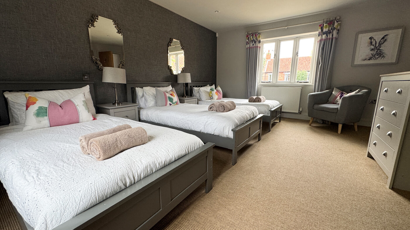 Woodcock three single beds