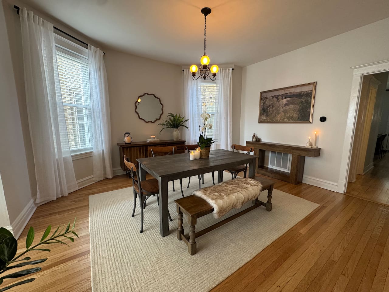 Dining room with large table perfect for group meals.