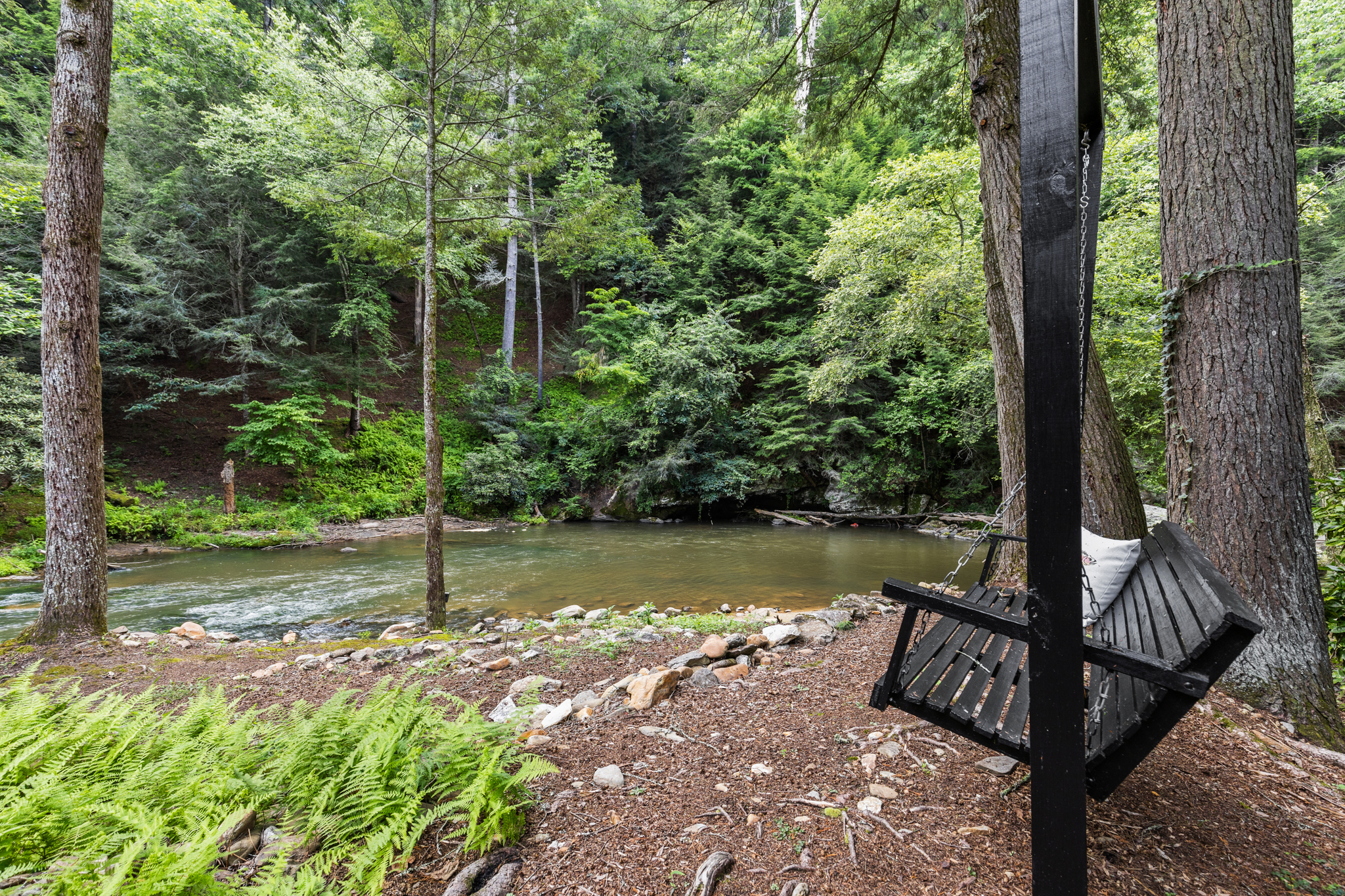 Start your morning with coffee or unwind at sunset on the riverside swing overlooking the water.