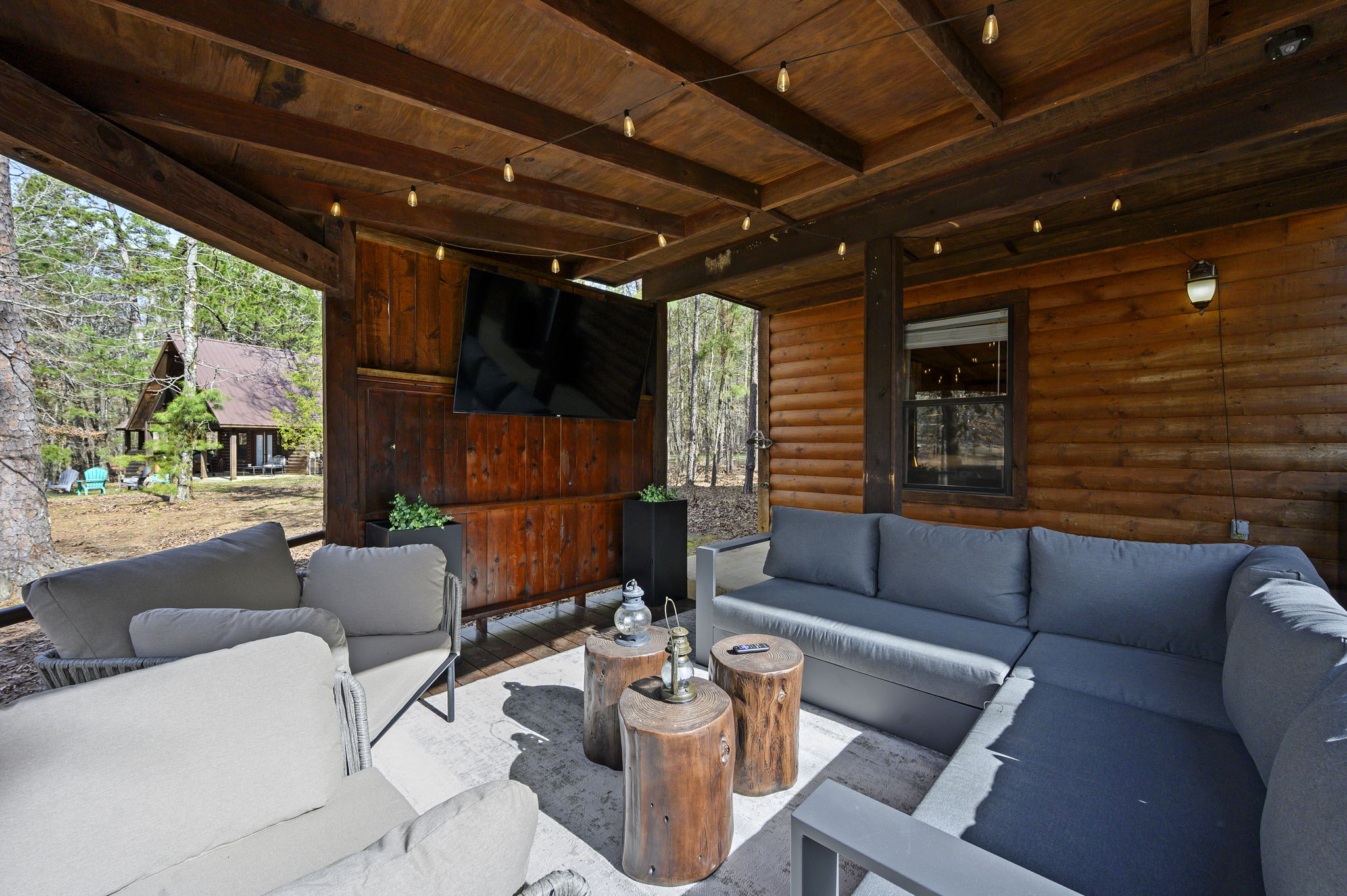 Spacious and shaded, this outdoor space makes every conversation feel elevated without leaving the cabin.