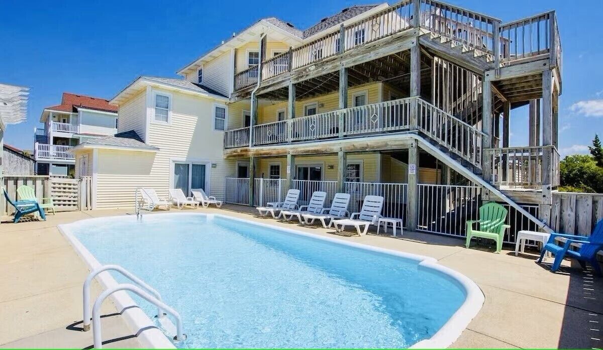 3-story house with pool, scenic backyard, and tranquil ambiance.