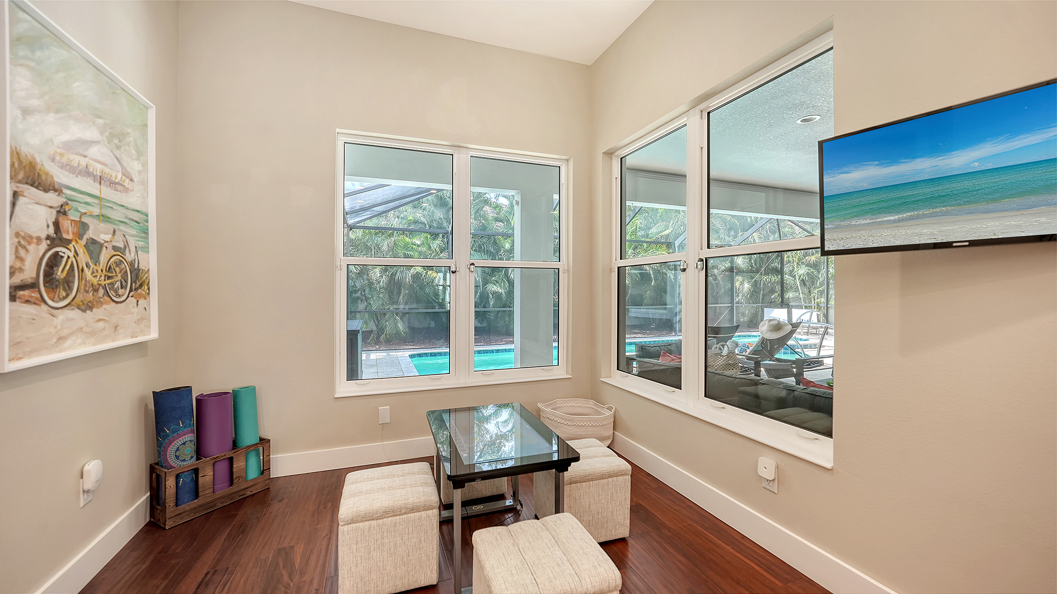 Activity room featuring yoga mats, TV and the Infinity gaming table