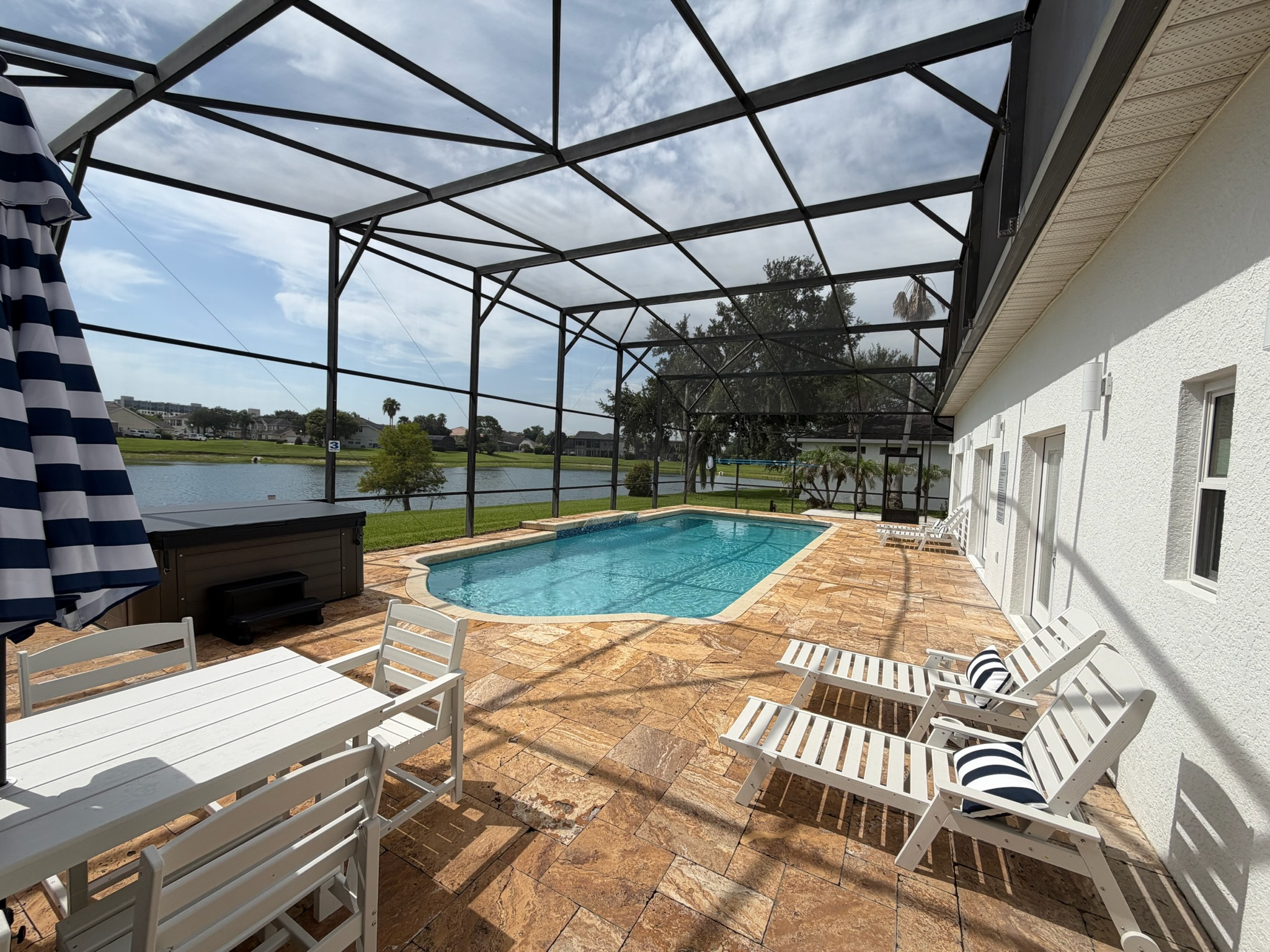 Large Stunning Pool with a real Hut Tub overlooking the lake
