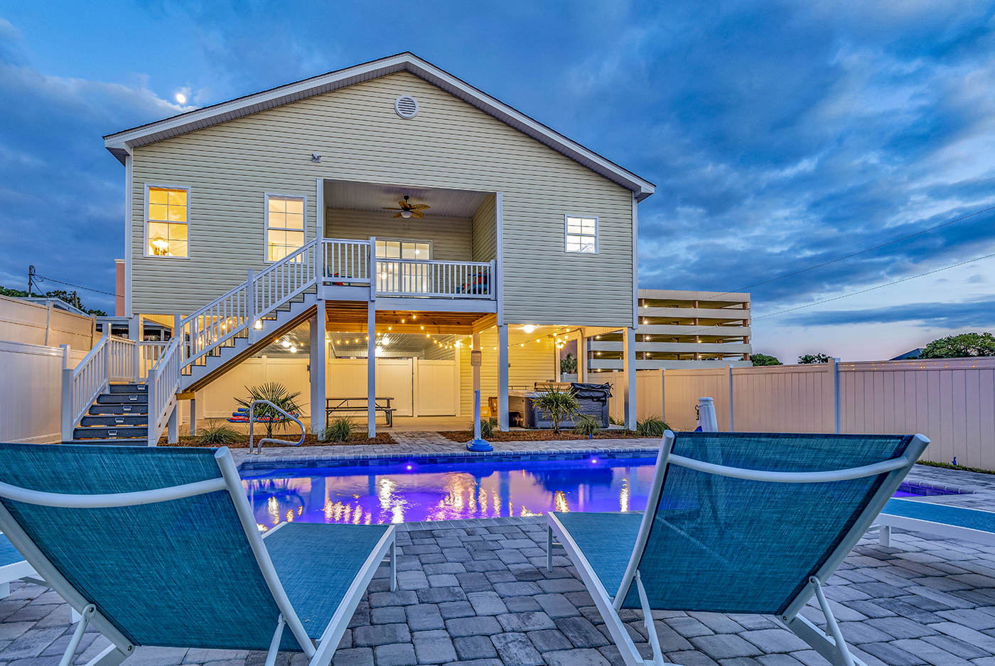 Enter a realm of enchantment as our swimming pool transforms under the night sky. Illuminated by gentle lights, its waters shimmer with quiet elegance, inviting you to unwind in the tranquil embrace of evening. Welcome to your oasis