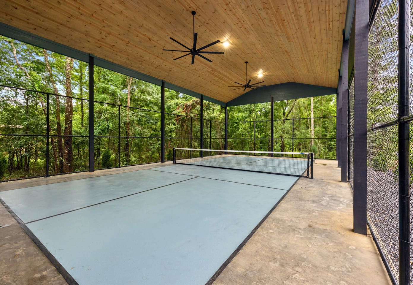 Play rain or shine under this beautiful wooden ceiling featuring two large fans to help keep cool during the heat. 