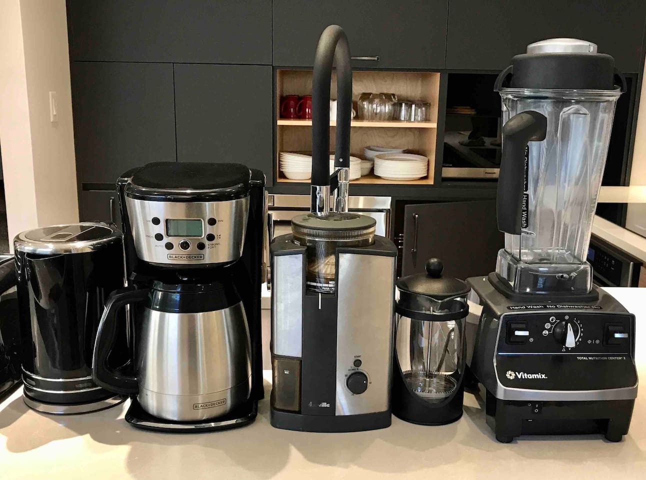 Drip Coffee Maker (10-cup Thermal Carafe)
French Press, Coffee Grinder, VitaMix Blender, Electric Kettle,  Nespresso Machine (small pods), dinnerware for 10.  Dining table seats 10 people.  High chair 