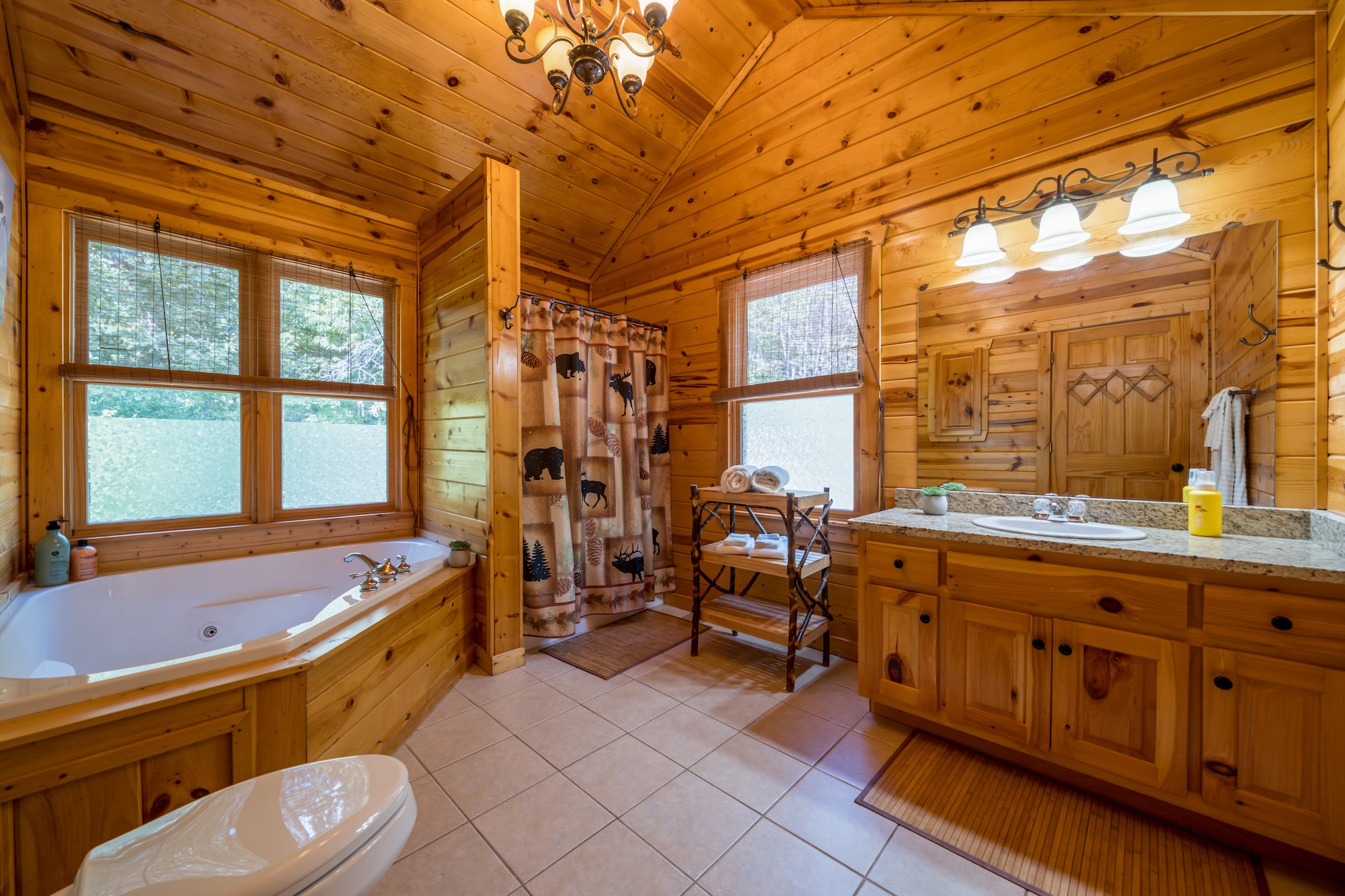 A full bathroom with a jetted tub and walk-in shower is just steps from the king bedroom, perfect for unwinding after a day of exploring. Complimentary shampoo, conditioner, and shower gel are provided for. 