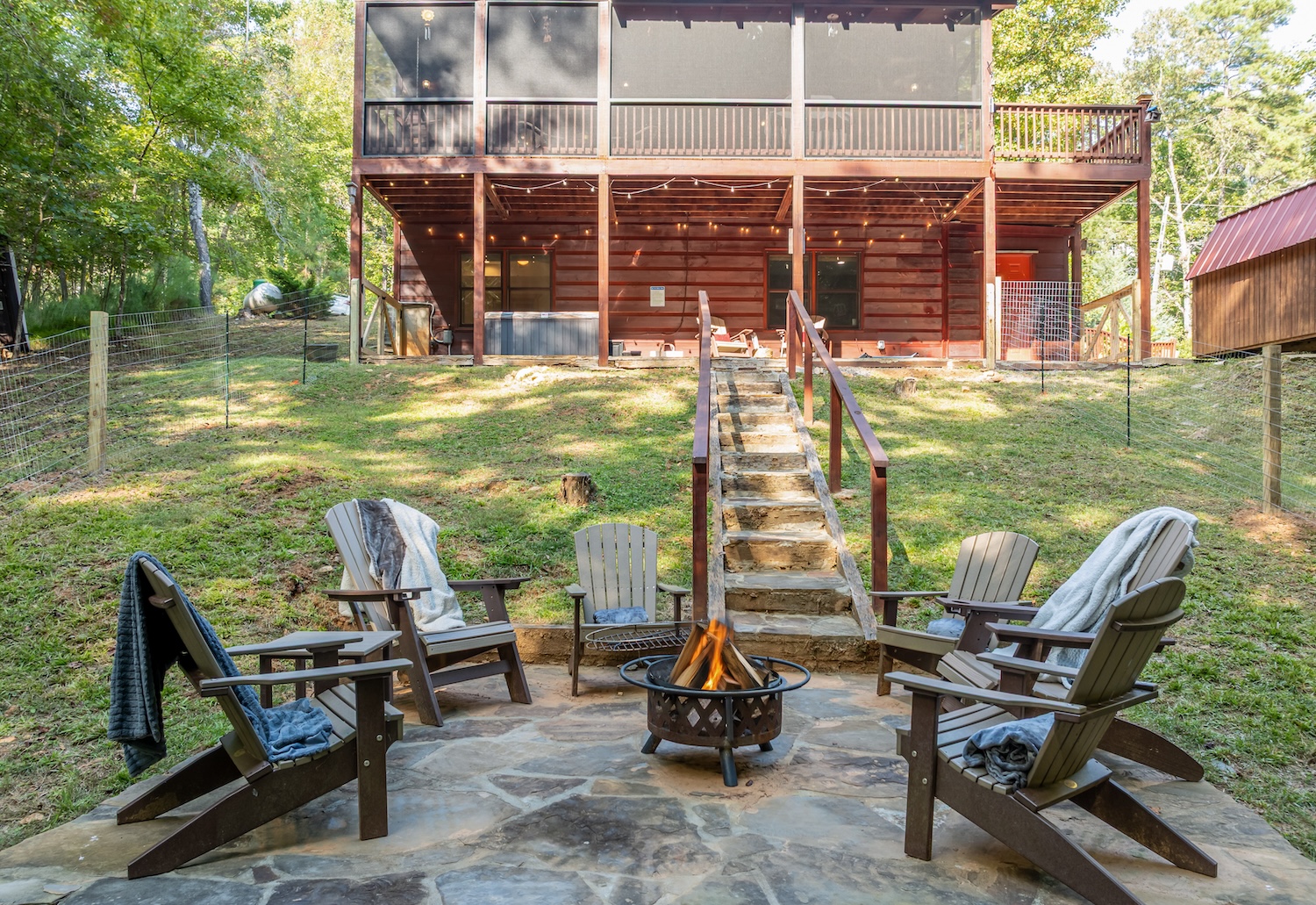 Stairs made out of stone leading up to the cabin are wide and comfy. Handrails on both sides for extra security and safety. Please watch your step.