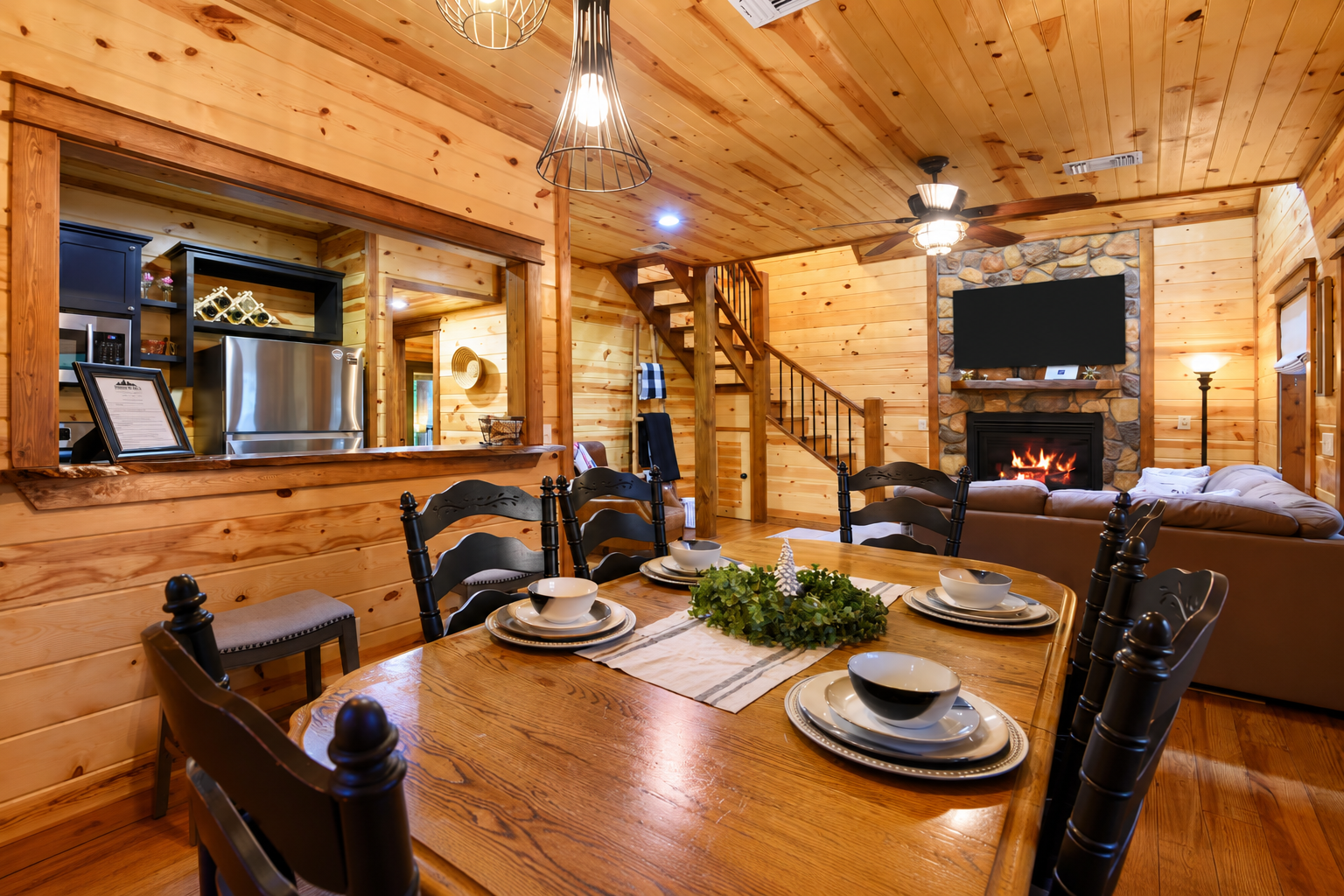 Dining Area: Gather around the stunning wooden table and enjoy meals in this charming space!