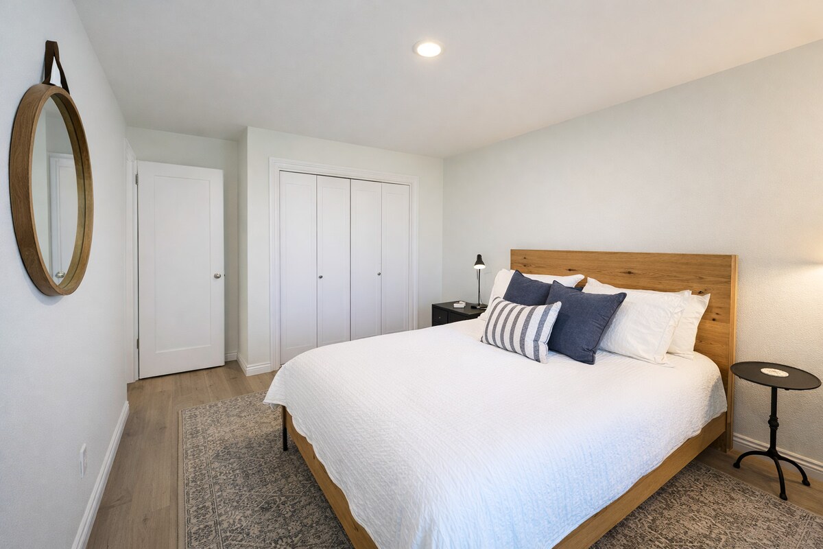 A tidy, comfortable bedroom ready to welcome you after a day of adventure.