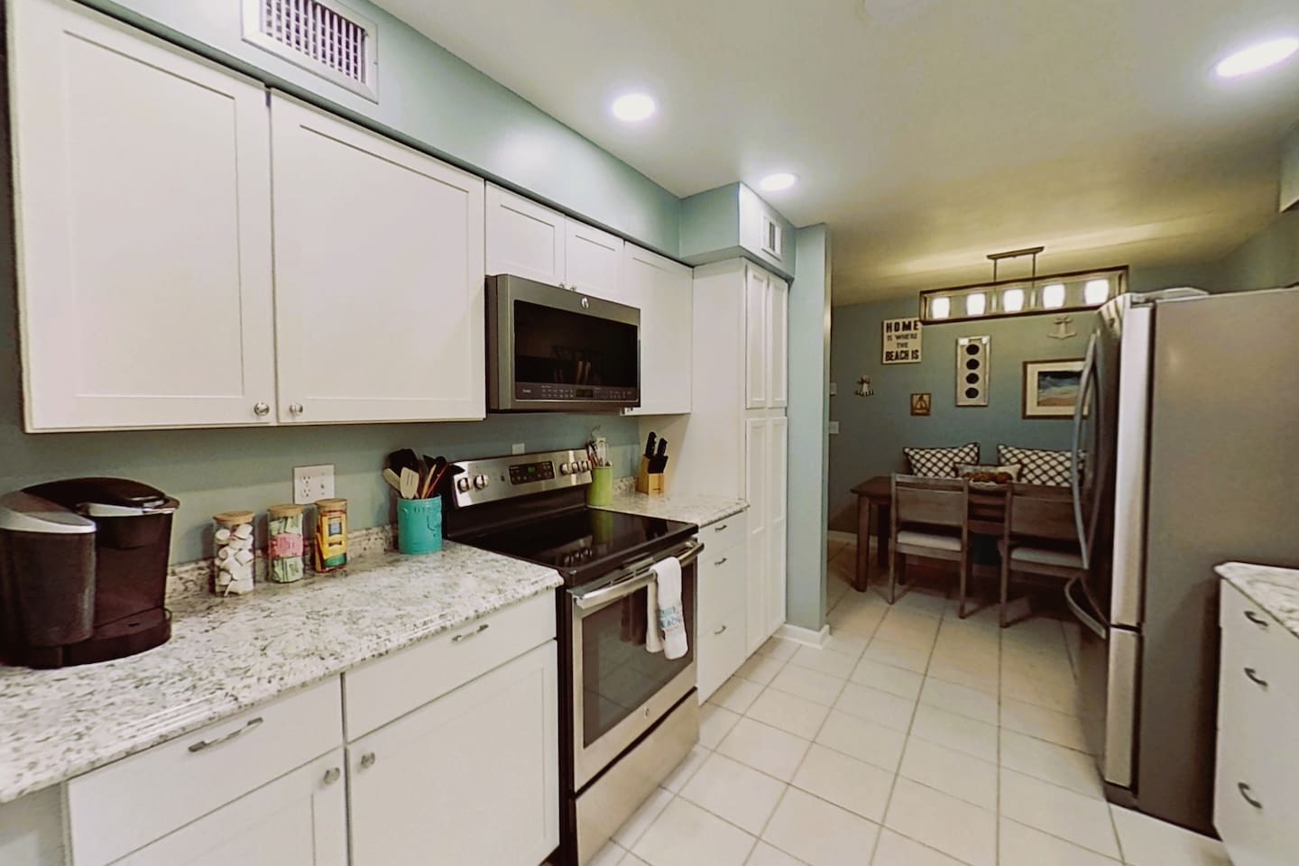 Galley Style Kitchen, with everything you need to cook a home-made meal, including pots/pans, utensils, select spices, salt/pepper, complimentary coffee/tea, reg/fr.Van creamer, sugar cubes, dishwasher tablets, dish soap