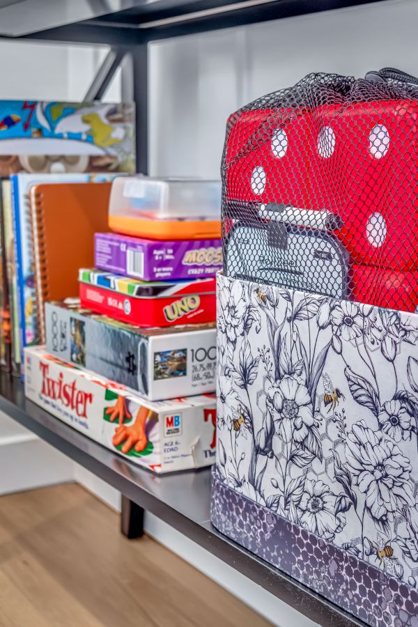 Sunrise cottage - offers plenty of indoor fun with a dedicated shelf stocked with board games, puzzles, and family activities—ideal for snowy nights in.