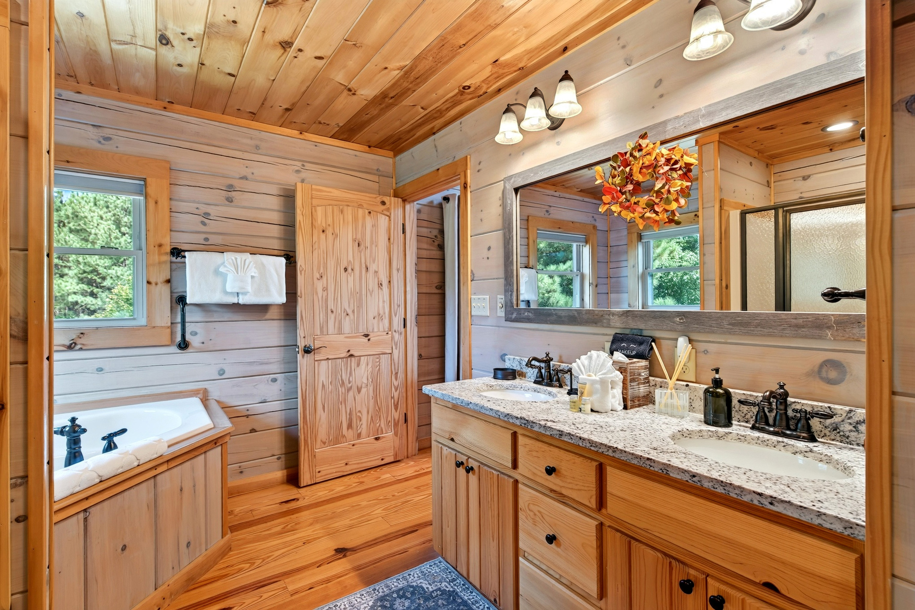 Master bathroom features a large, soaking tub