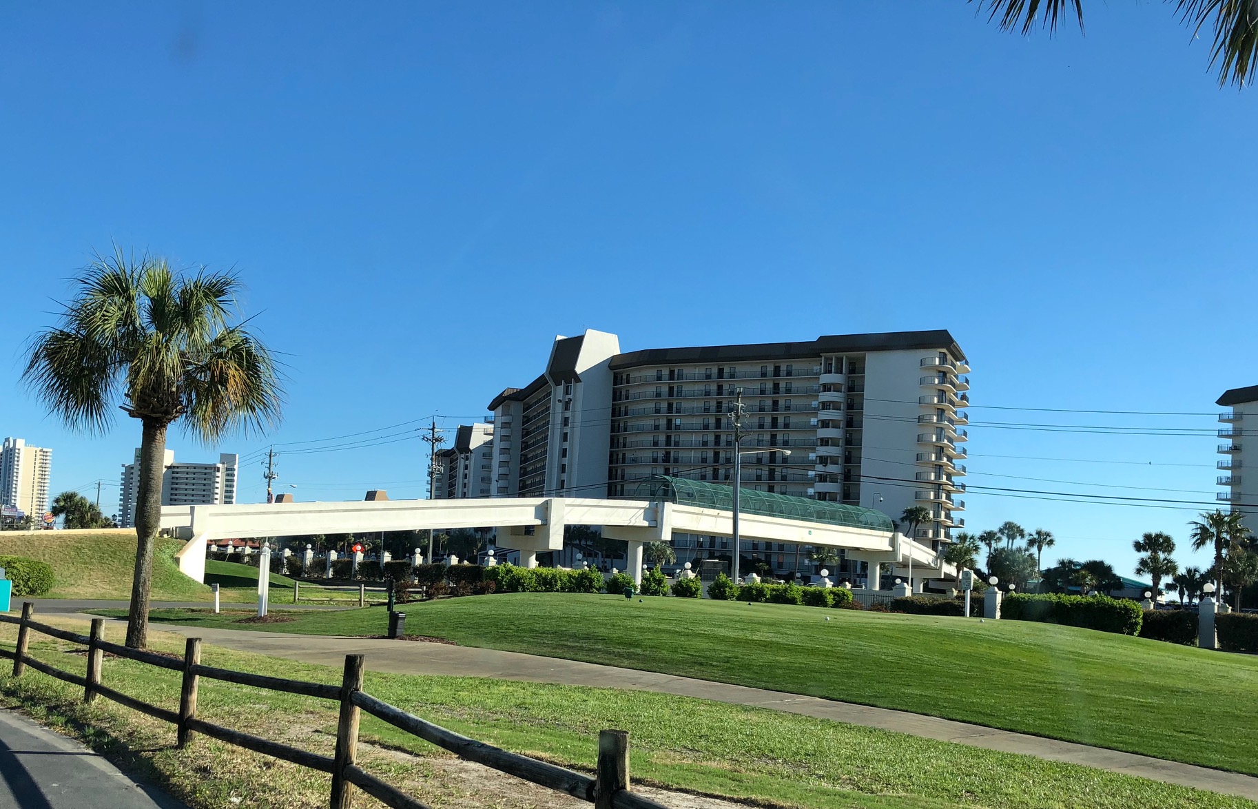 Pedestrian bridge to golf and club