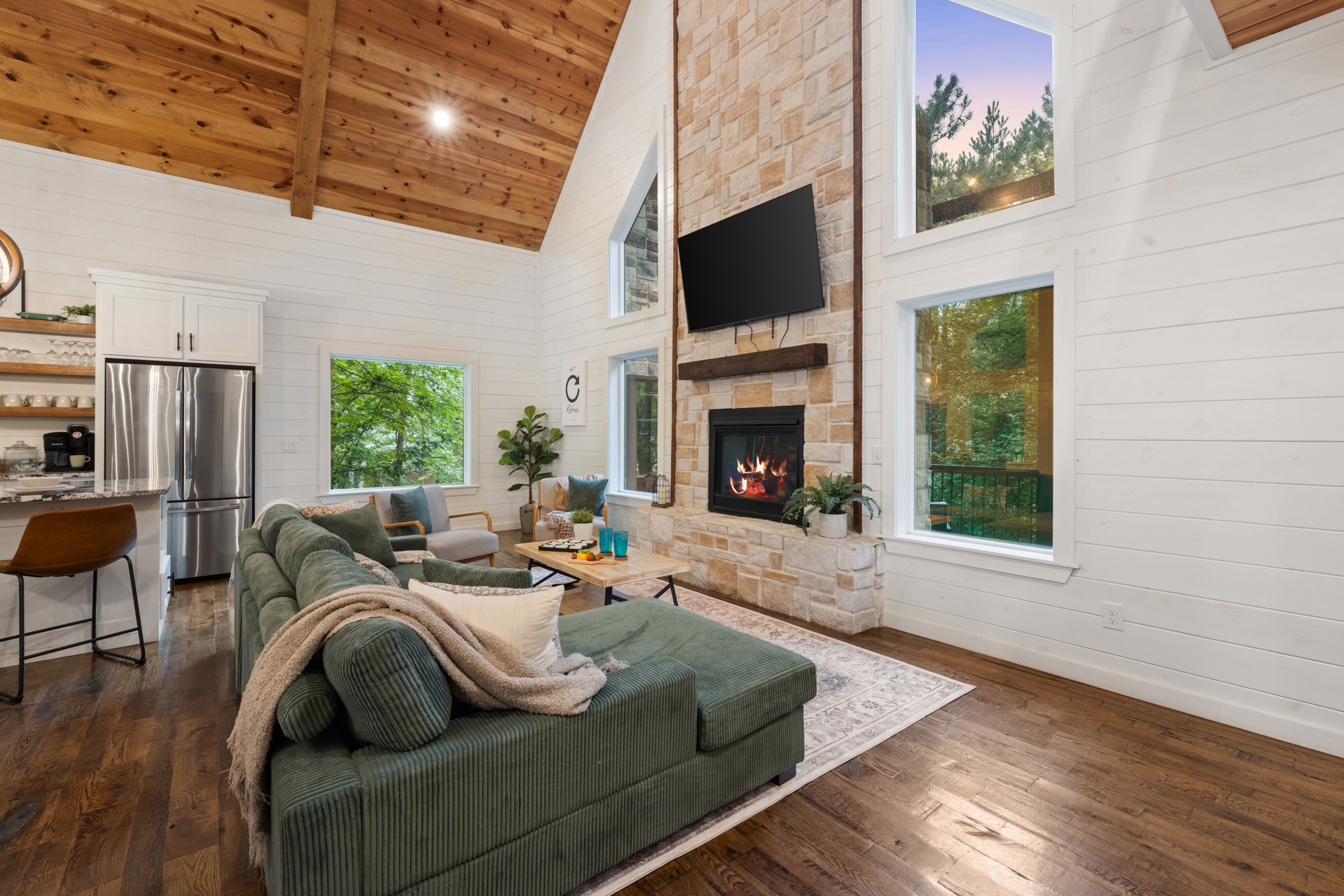 The heart of the cabin, where comfort and connection come naturally. 
From movie nights on the couch to quiet mornings by the fire, this space was designed for slowing down beautifully.