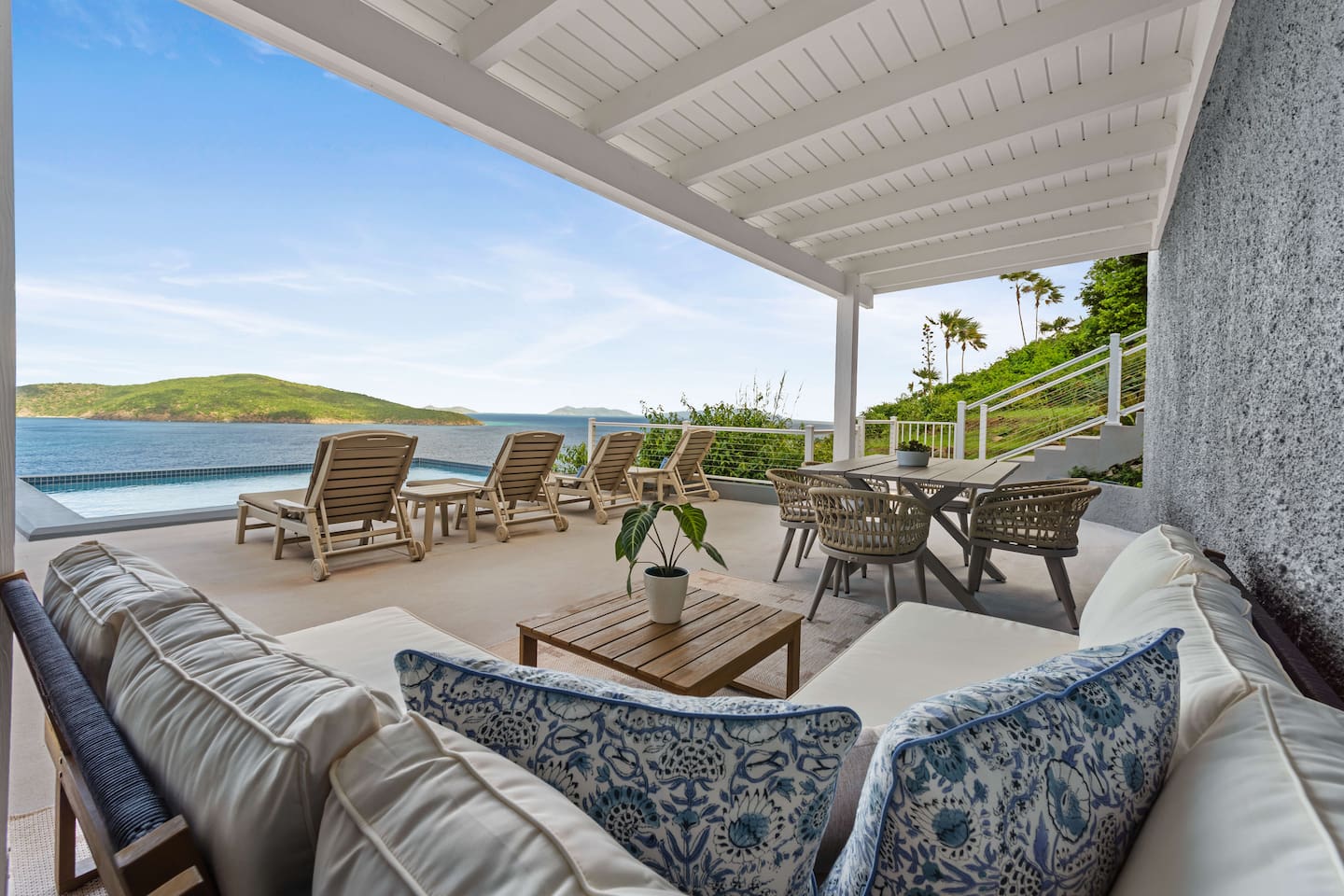 Enjoy the shade on the outdoor couch or soak up the sun on the chaise lounges! 