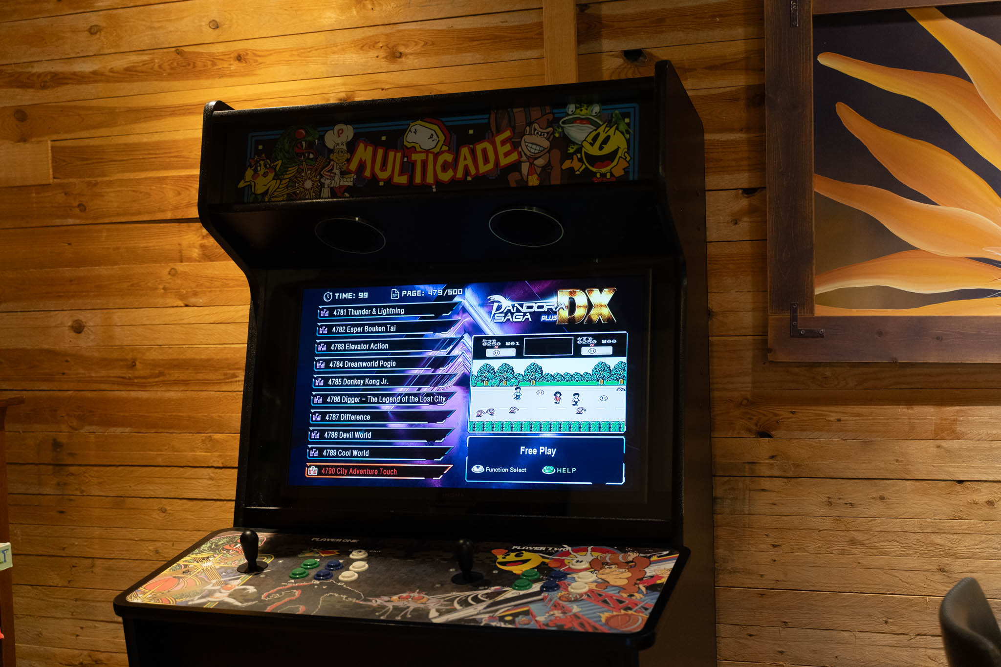 Arcade machine. Coins not needed here.