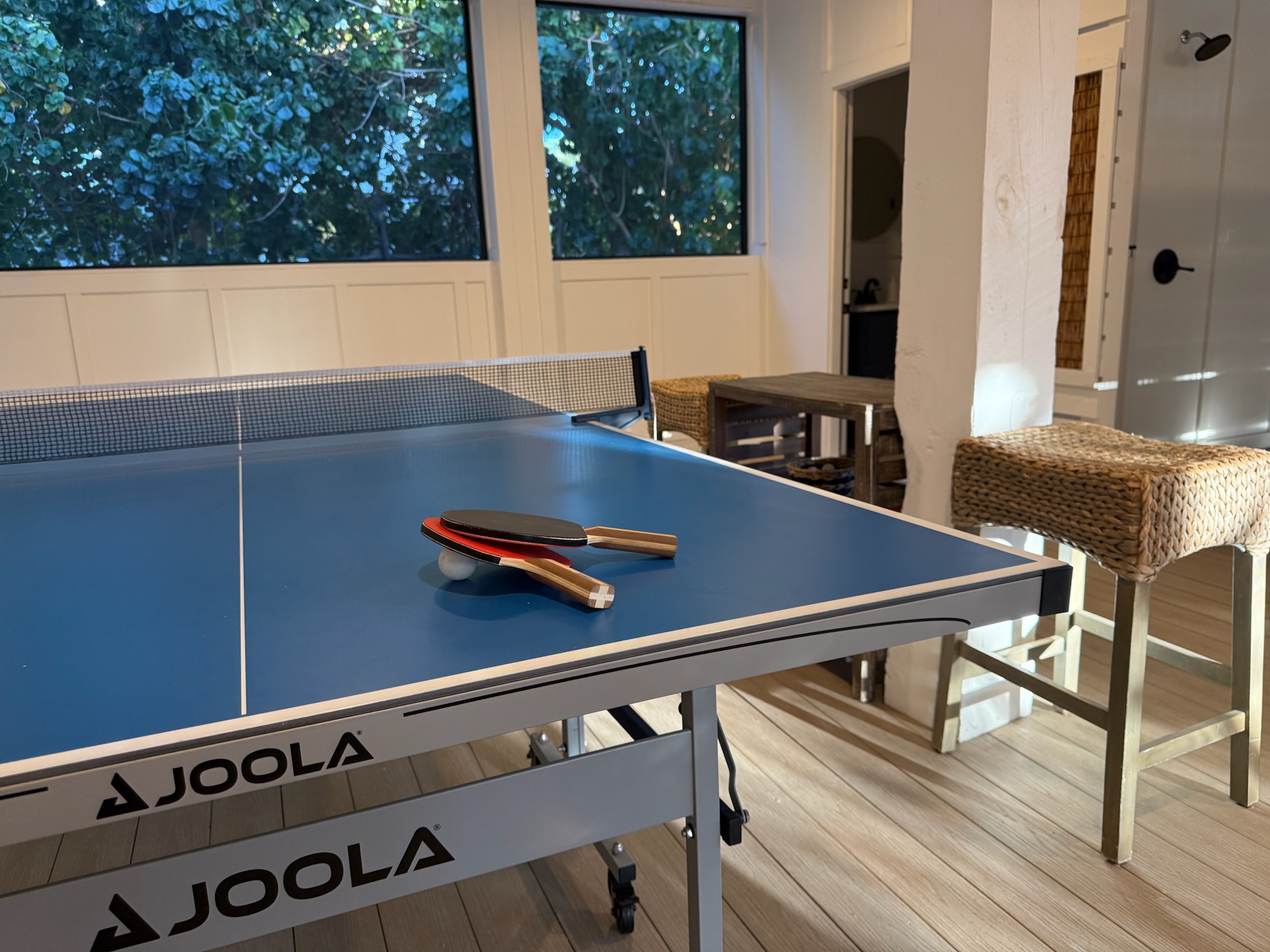 Ping Pong anyone? Play anytime day or night in the screened-in lower level area