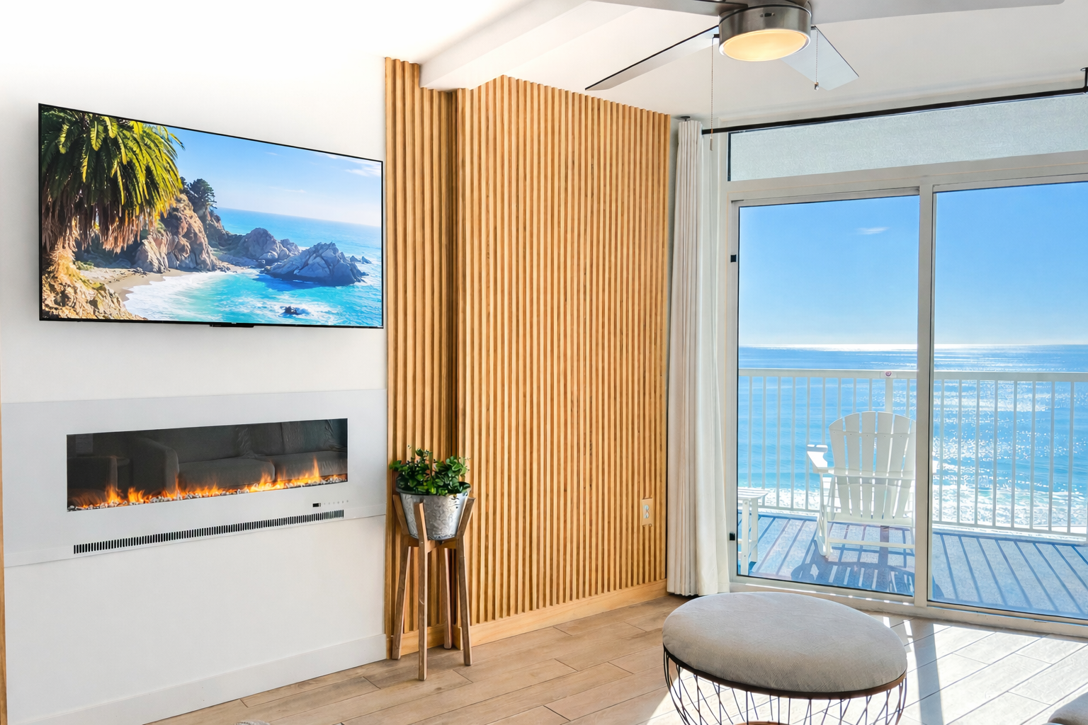 Large smart HDTV and fireplace in the living room 
