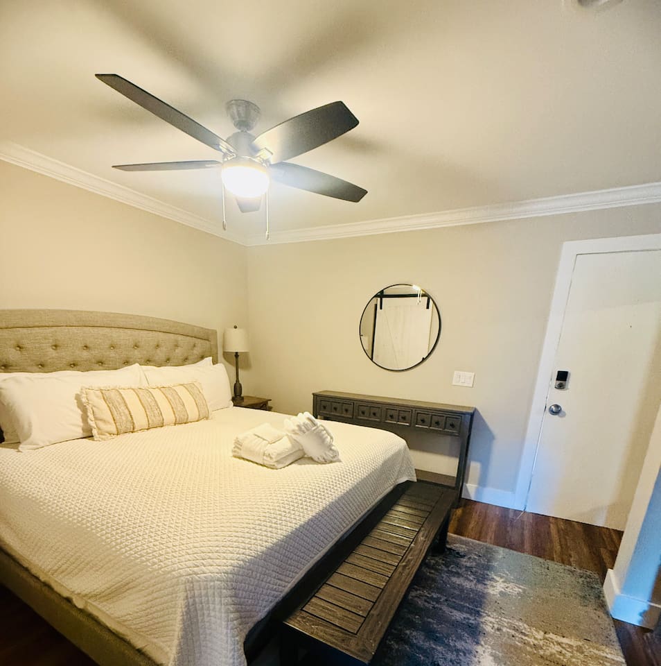 Bedroom with the villa entrance door