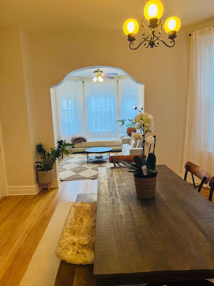 beautiful dining table perfect for group meals, game night, or planning your Chicago adventures.