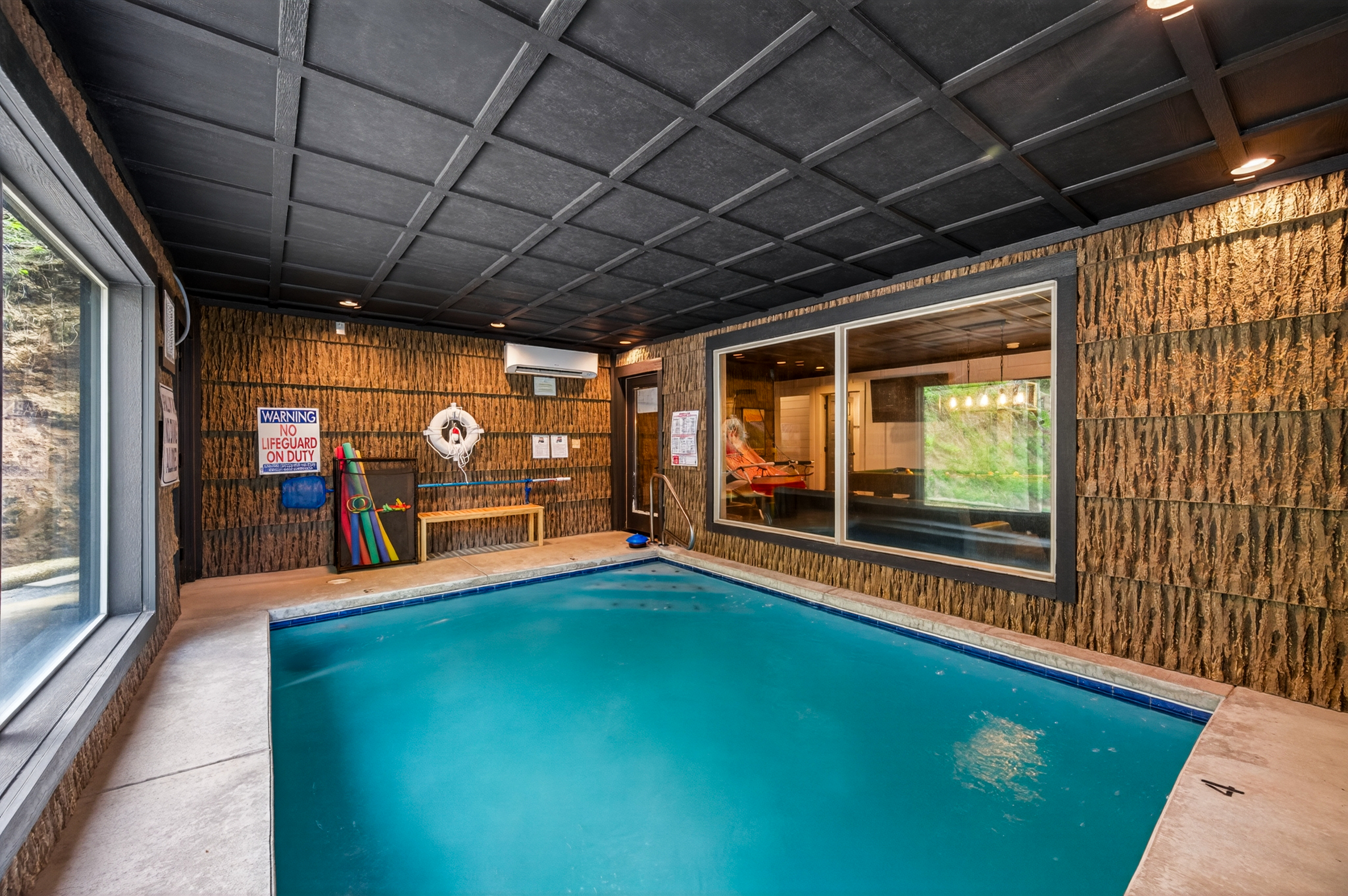 Indoor swimming pool. Self-locking safety doors and alarms.