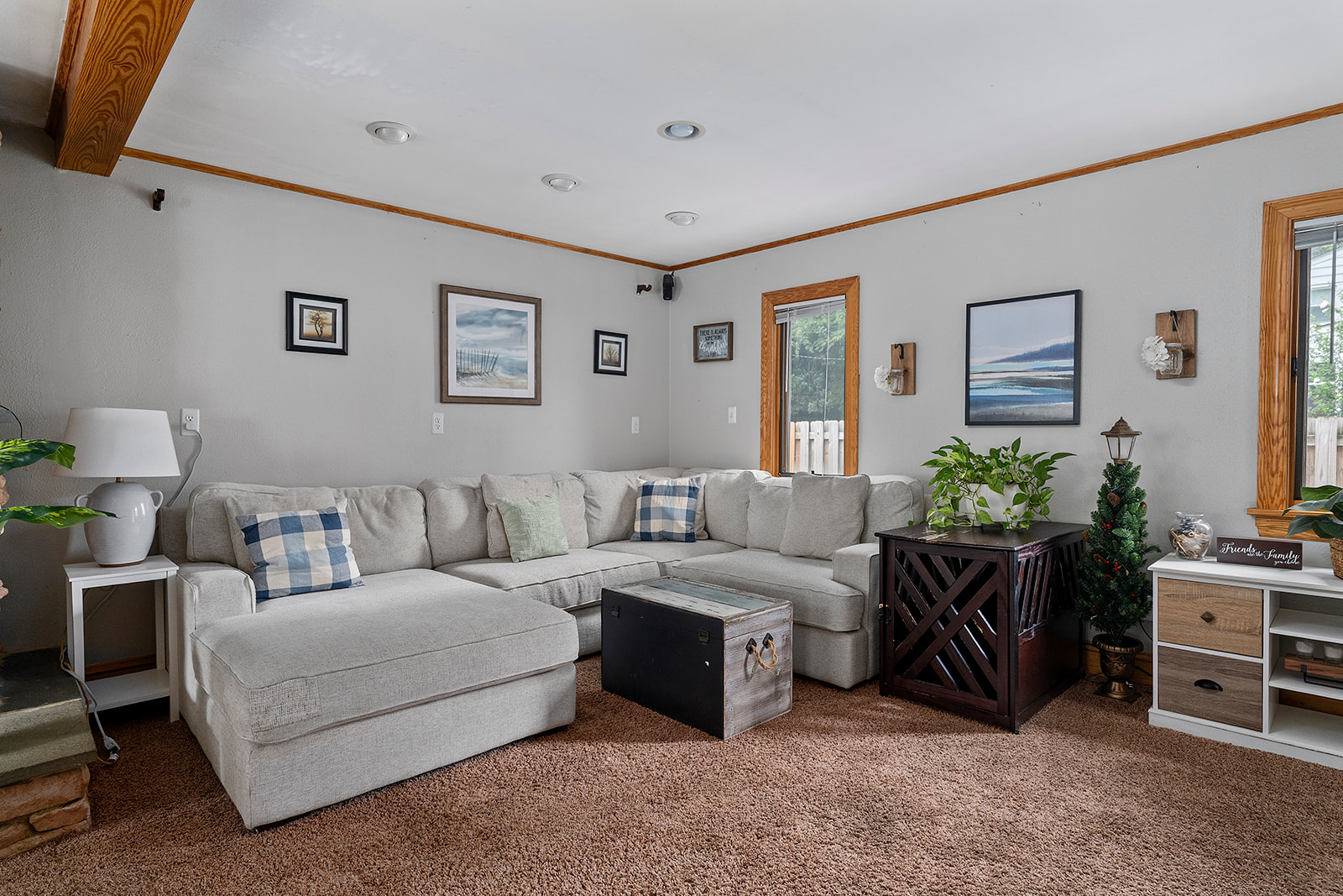 Living Room: Sun-soaked space with comfy seating, stylish decor, and a welcoming vibe!