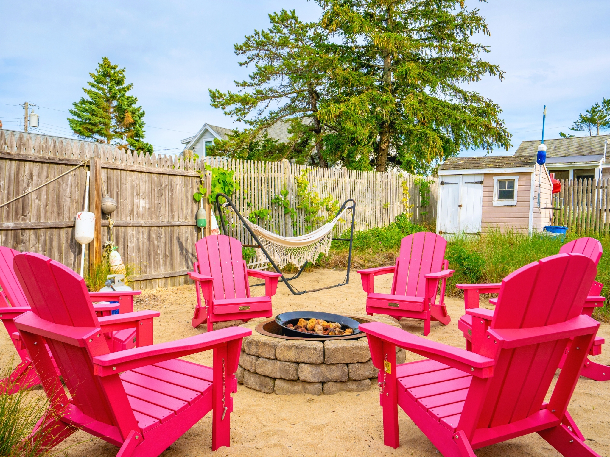 After a long day, the firepit and hammock are here to help you unwind and relax.