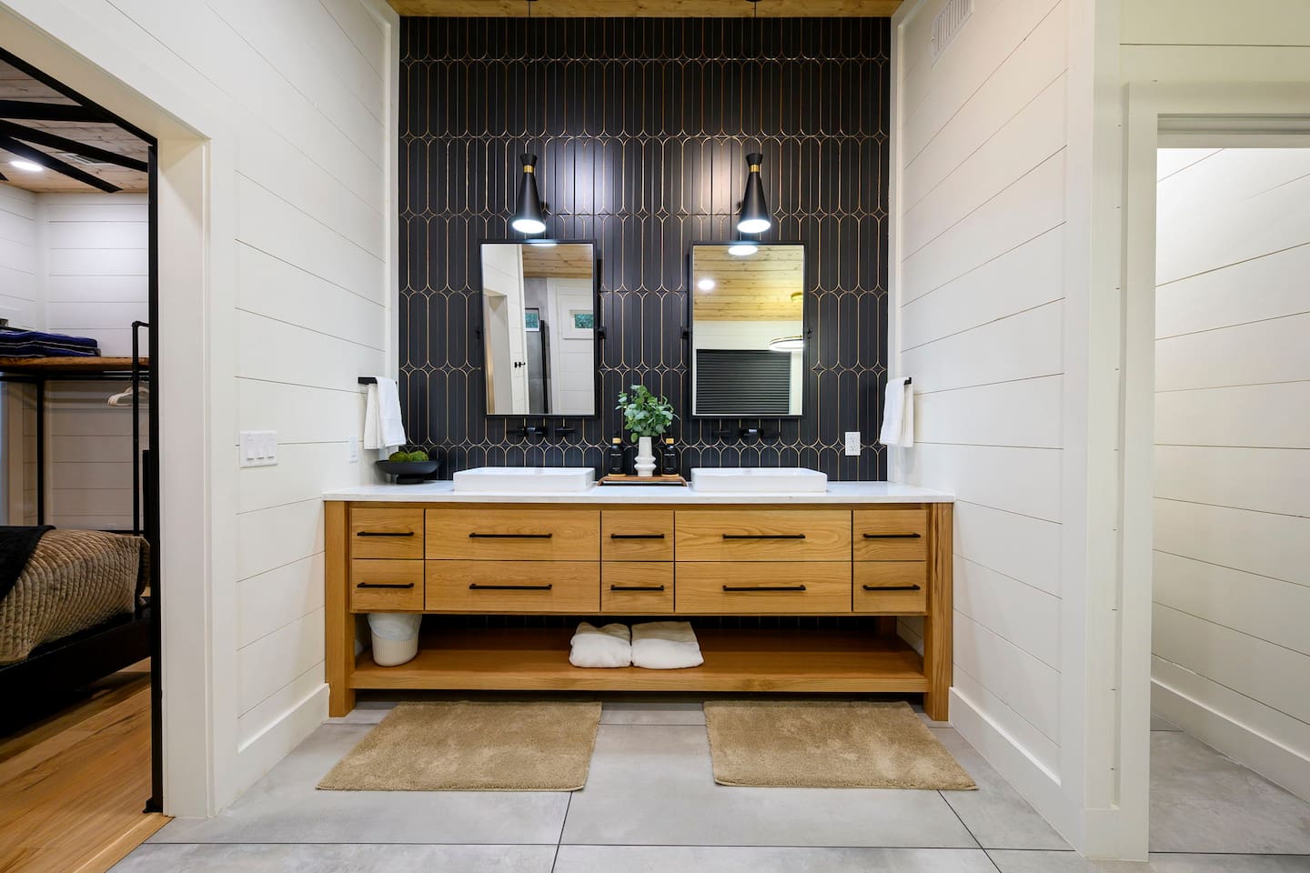 Spacious double vanity with elegant finishes, plenty of counter space, and room for two to get ready comfortably.