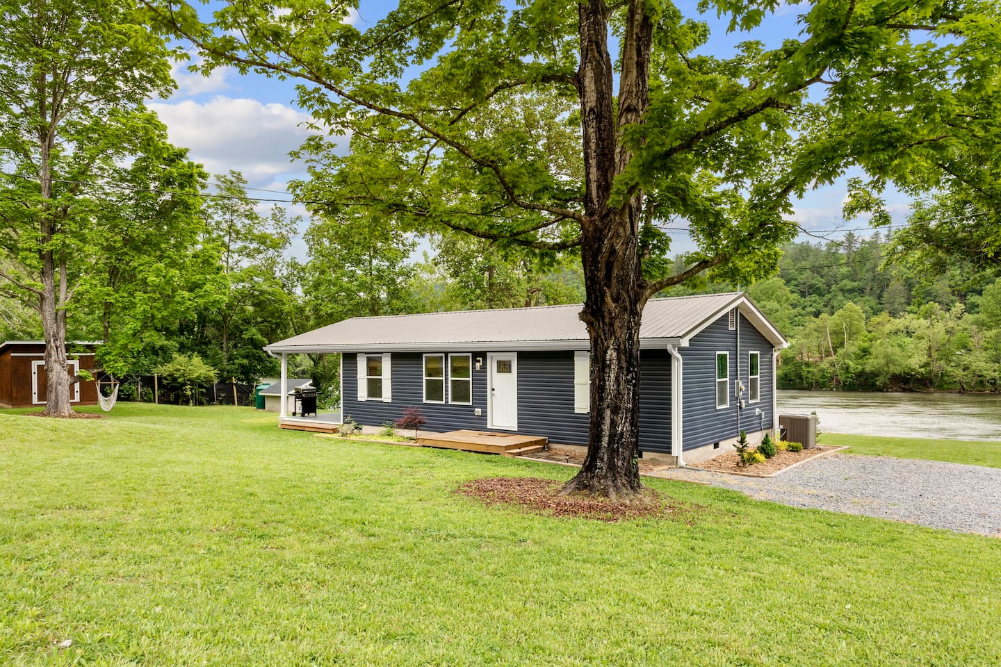 Sweet Casa Del Rio, with the French Broad River beyond