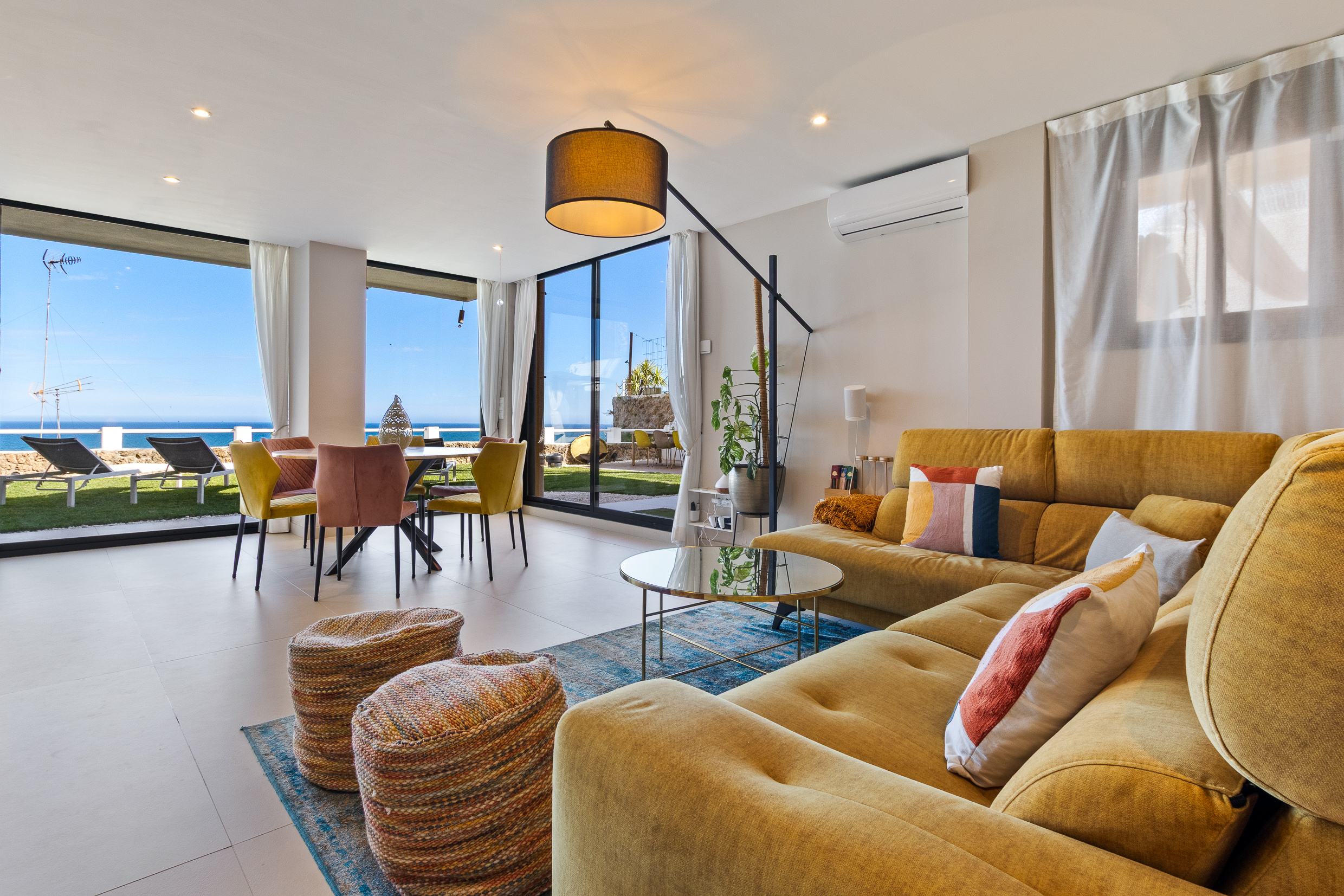 Spacious living room with comfortable seating and natural light