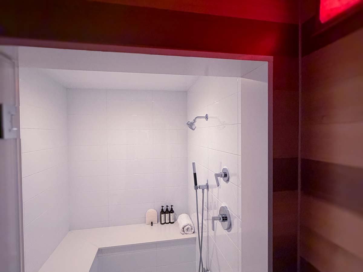 Steam room at Sunset Falls &mdash; glass-doored and tiled, spa soap and loofah &mdash; Berkshires spa suite