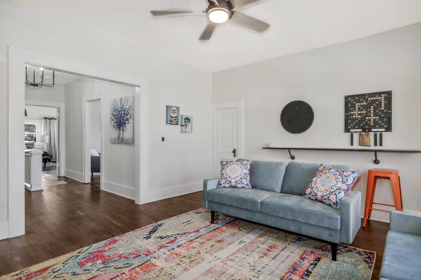 Eclectic Decor with games on the wall.