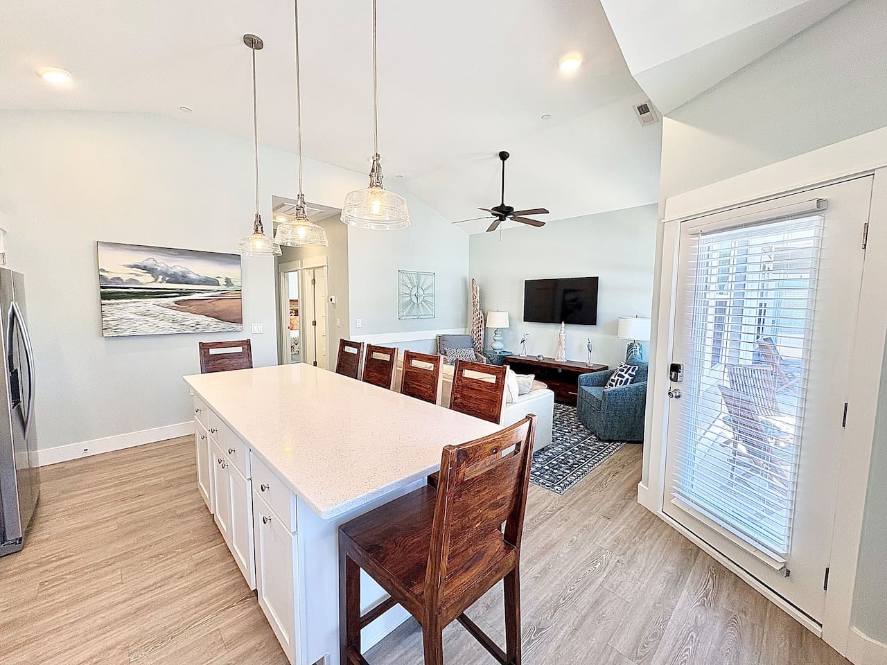 Open-concept kitchen, dining, and living space