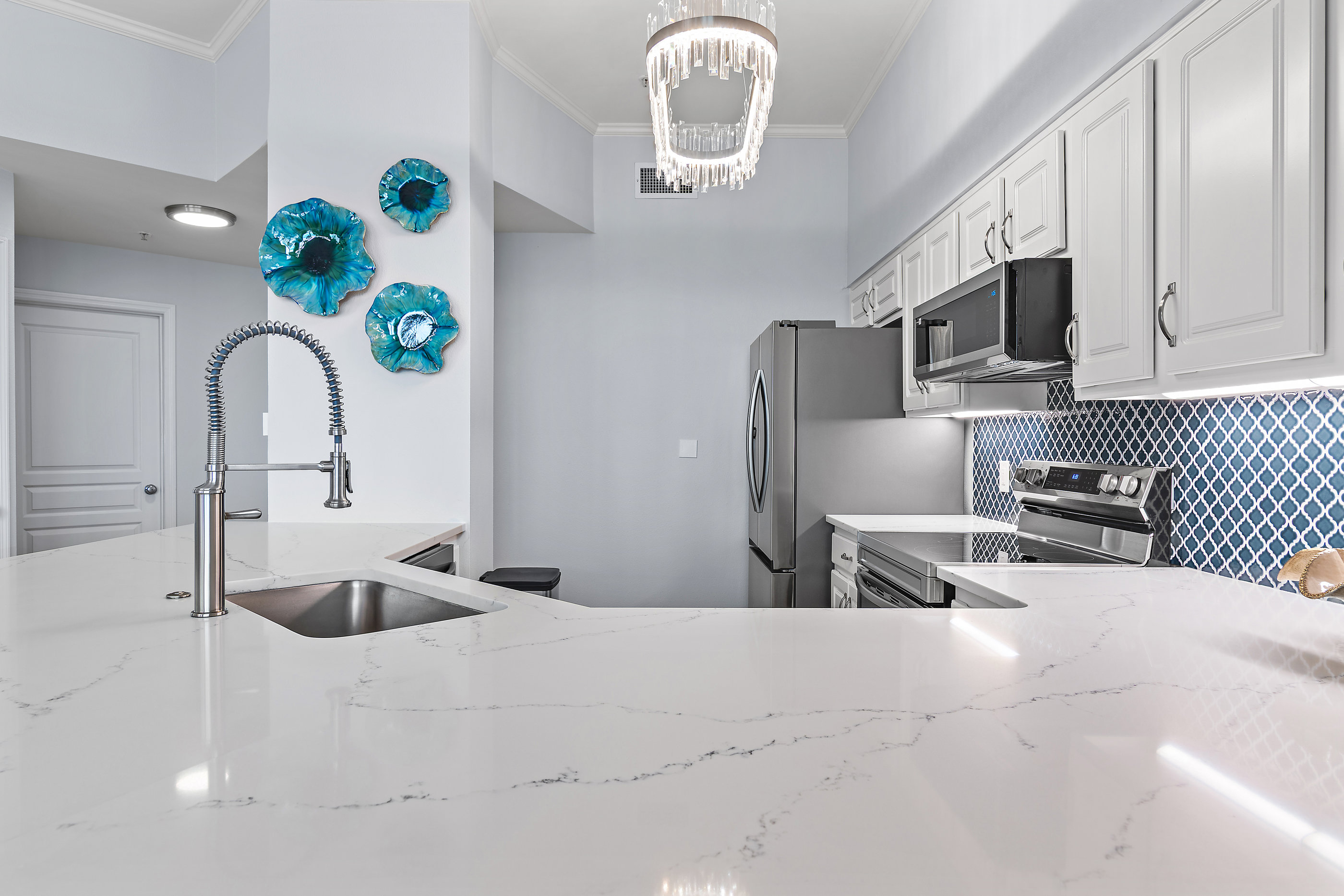Stainless steel appliances and custom cabinetry