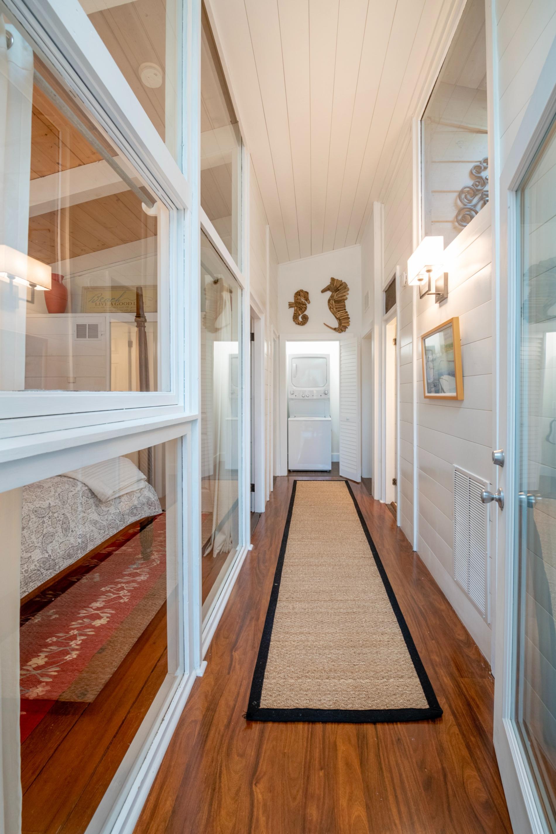 Hallway showcasing heart pine floors