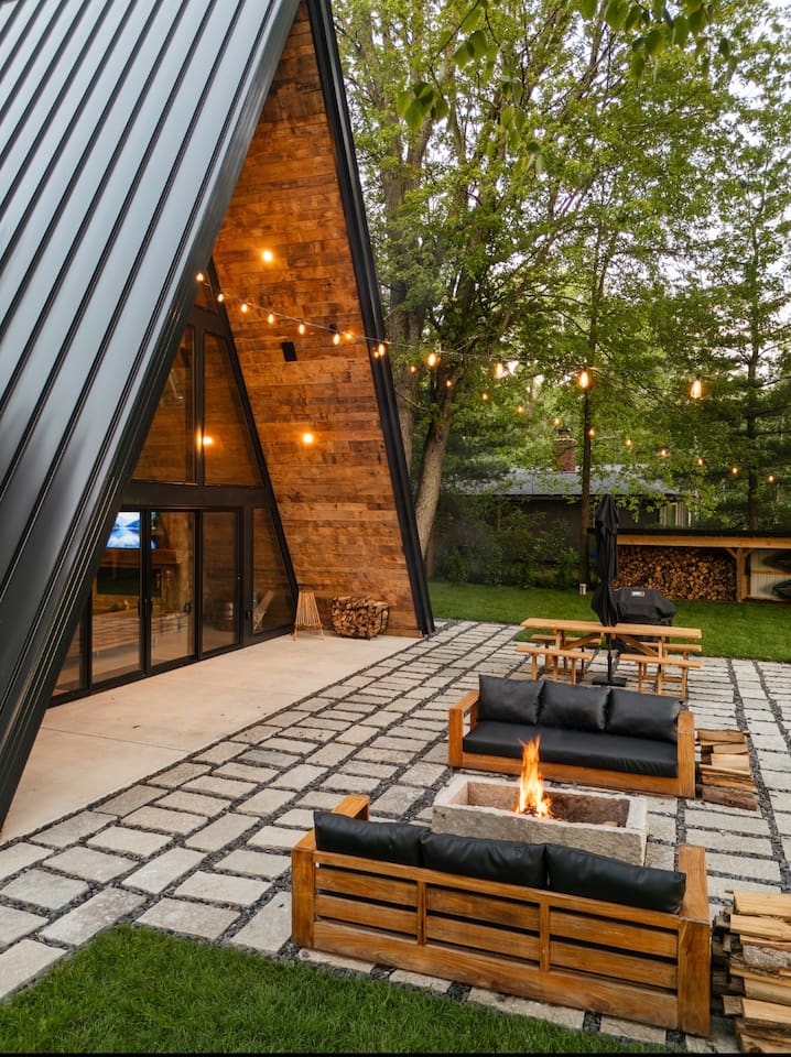 Fire pit with grilling screen for burgers over the fire 
