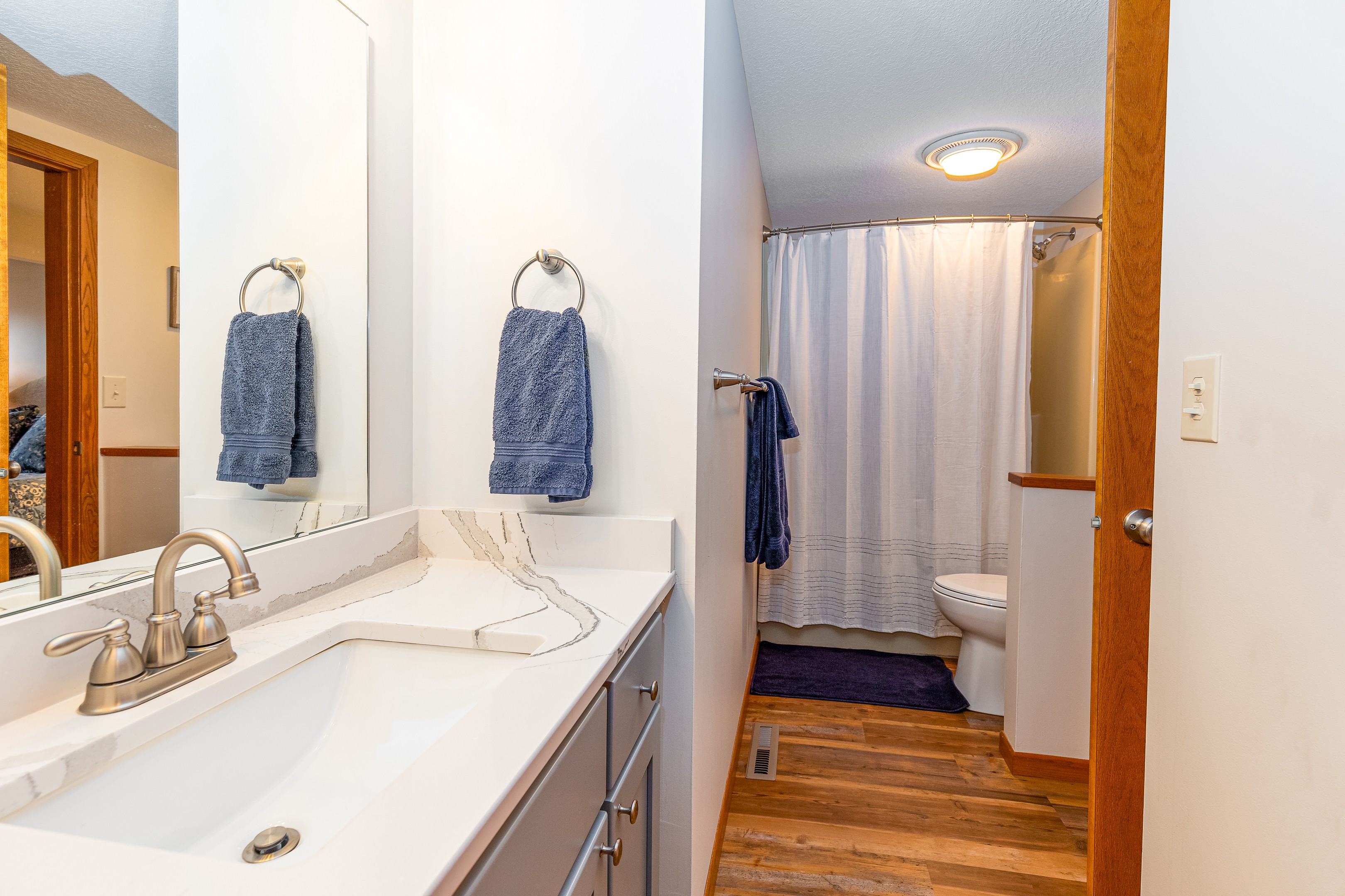 The bathroom is ensuite to the main floor bedroom and accessible from the main living area