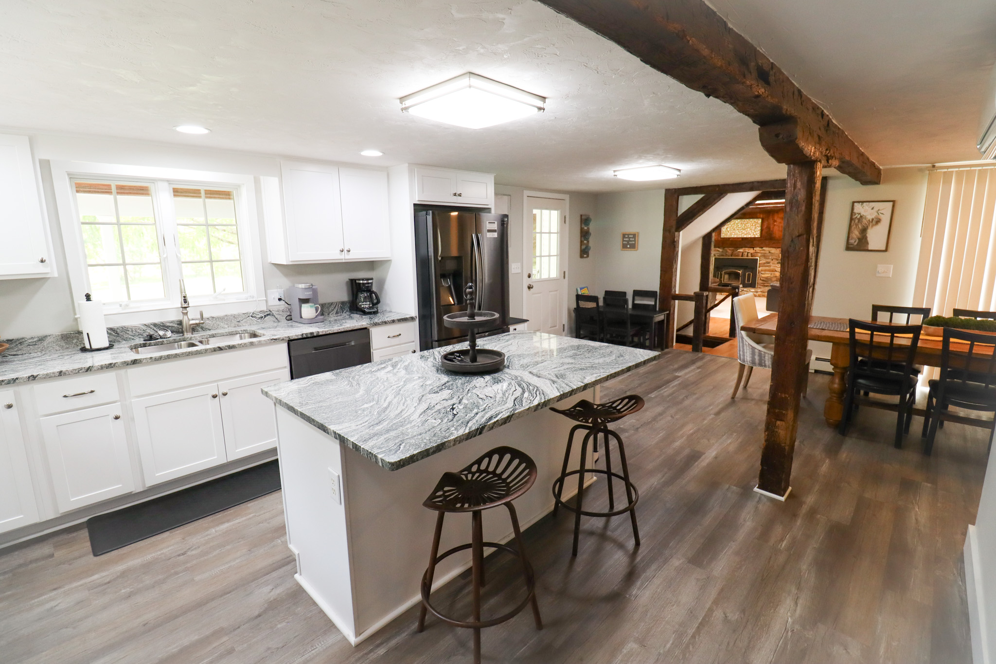 Spacious country kitchen stocked for family meal preparation