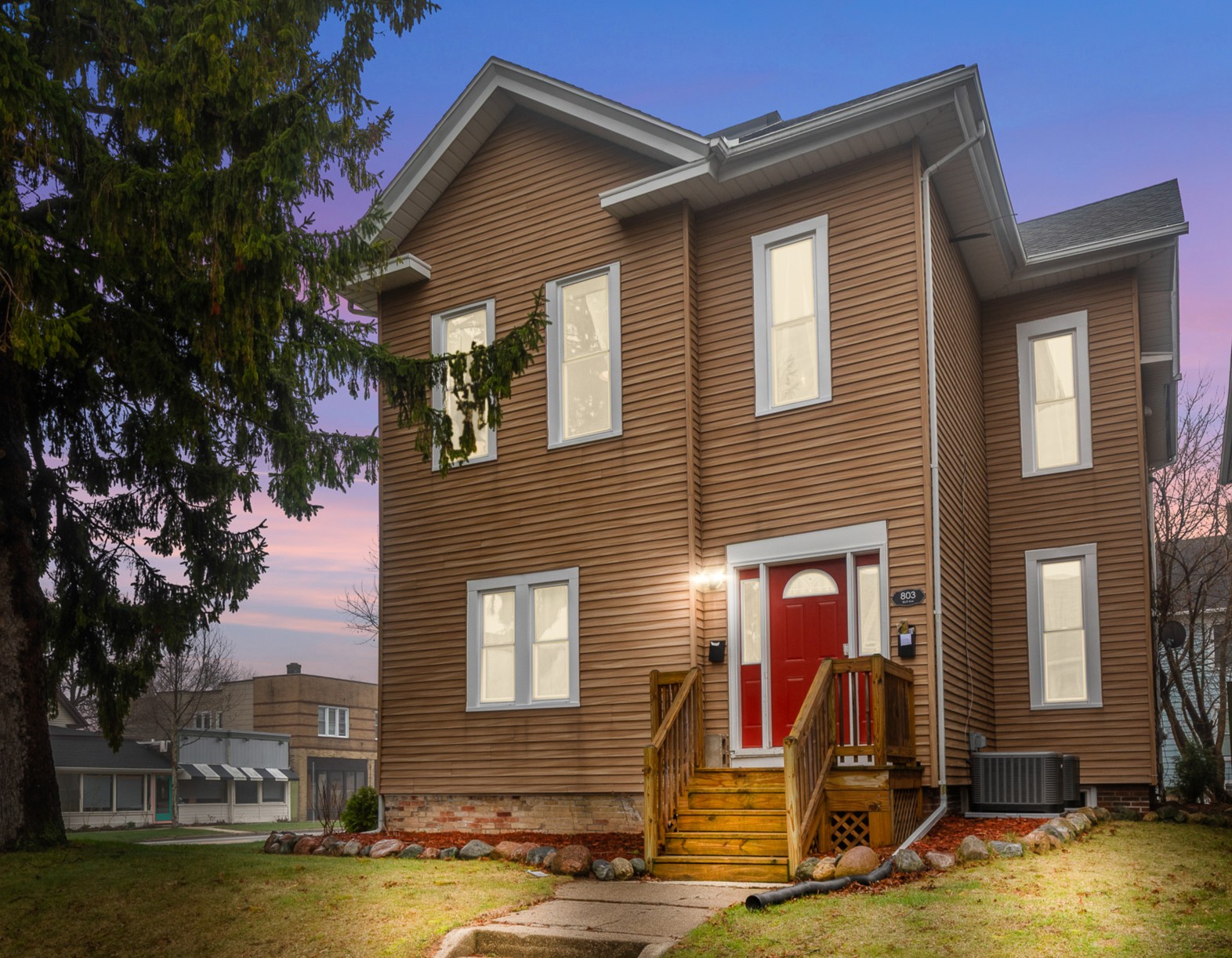 Front entry to shared foyer from Bluff Ave